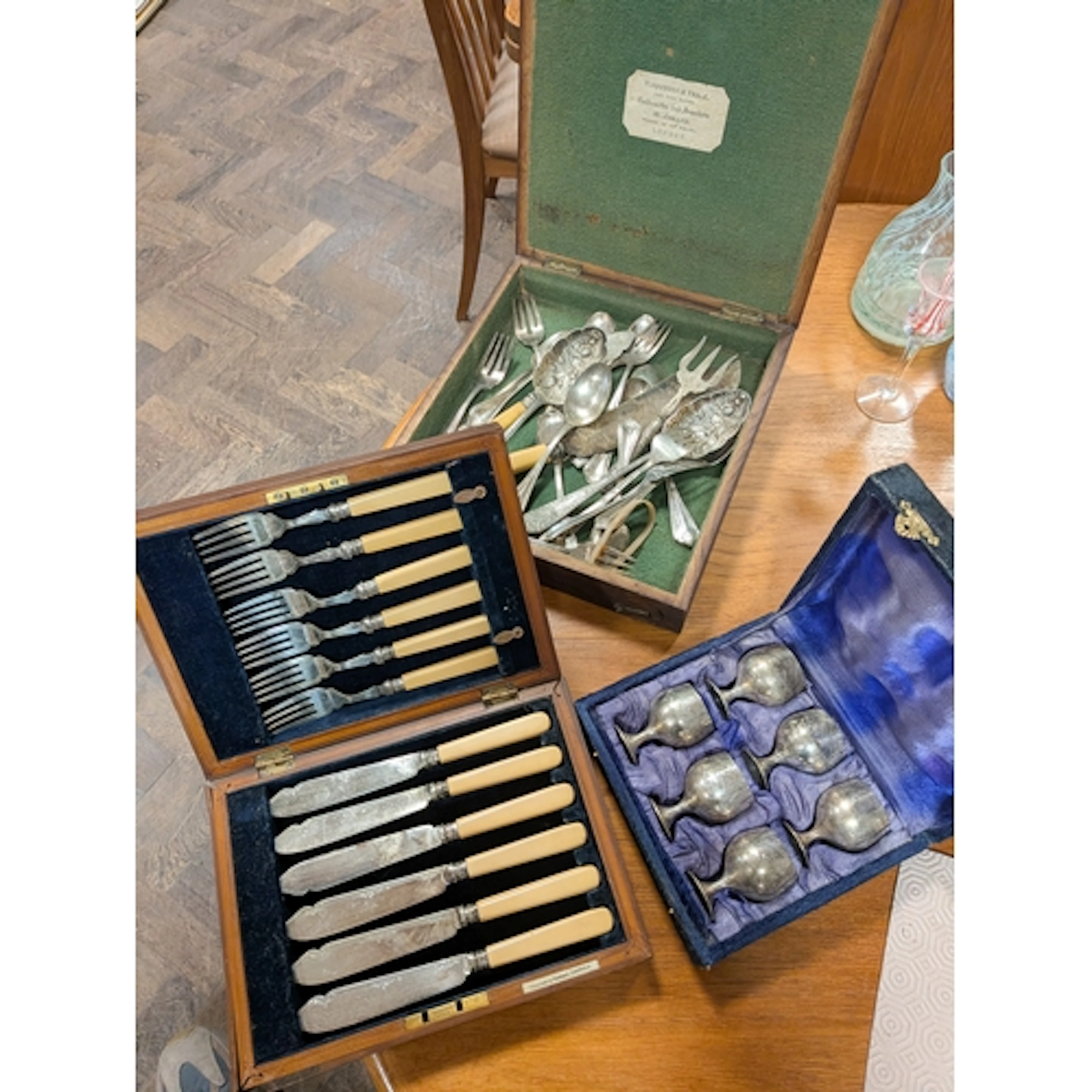 A set of fish knives and forks together with six small pewte...