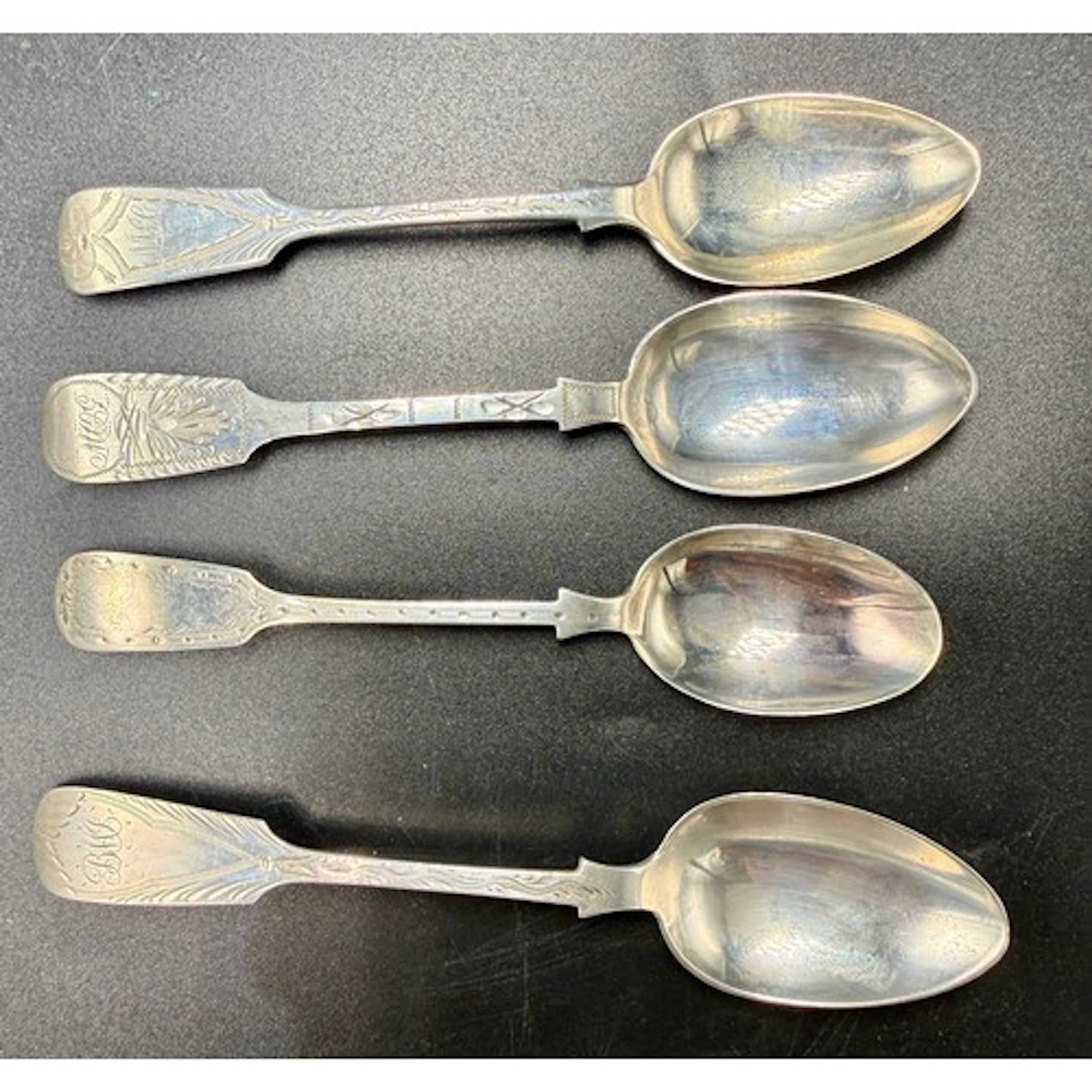 Four Exeter bright cut silver spoons to include Josiah Willi...