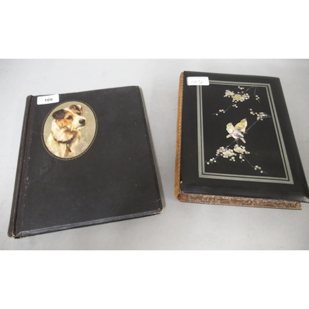 Vintage album containing thirty four various postcards, toge...