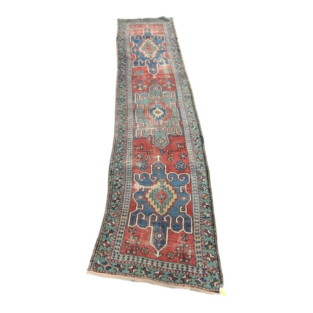 An early 20th century hand woven floor carpet rug runner. Ri...