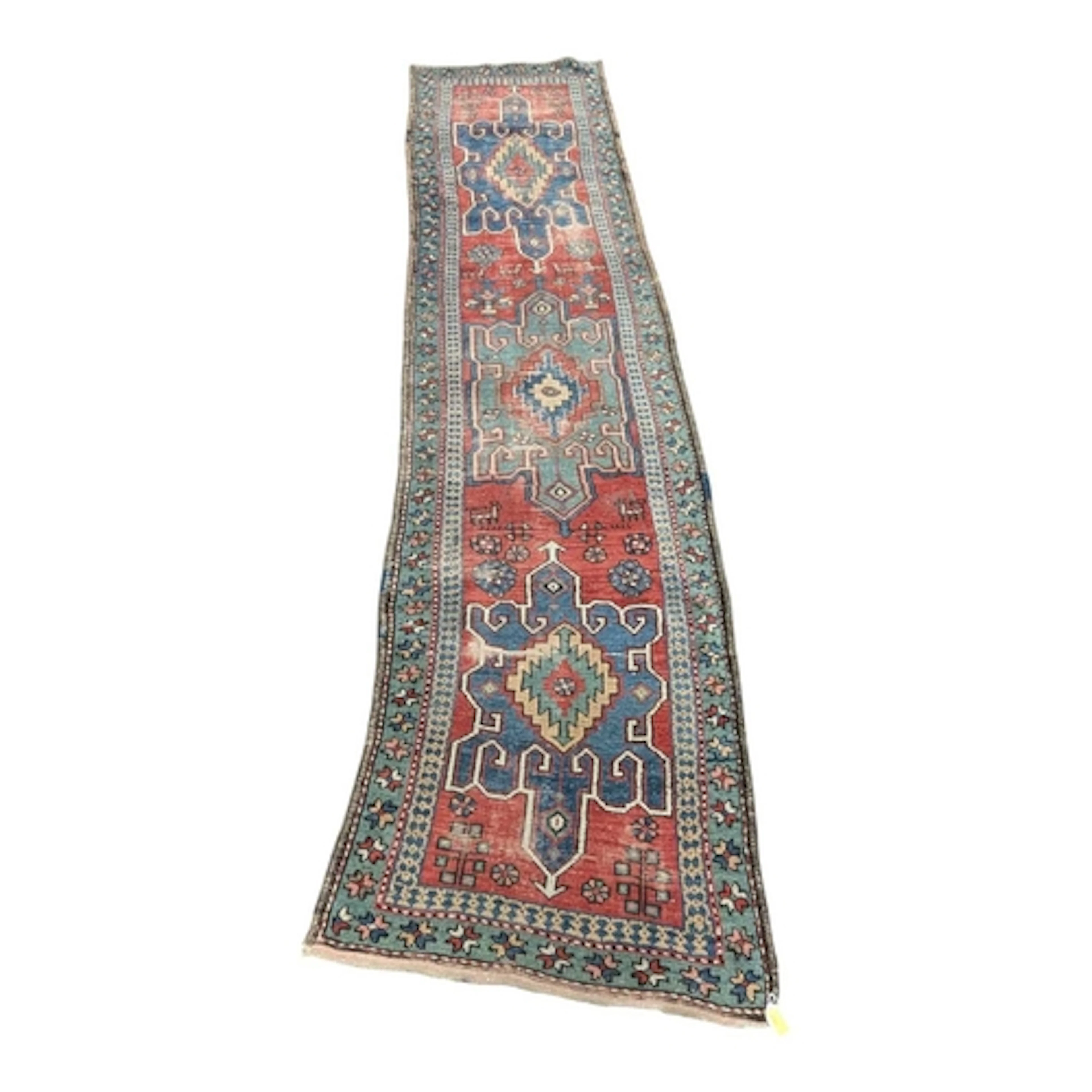 An early 20th century hand woven floor carpet rug runner. Ri...