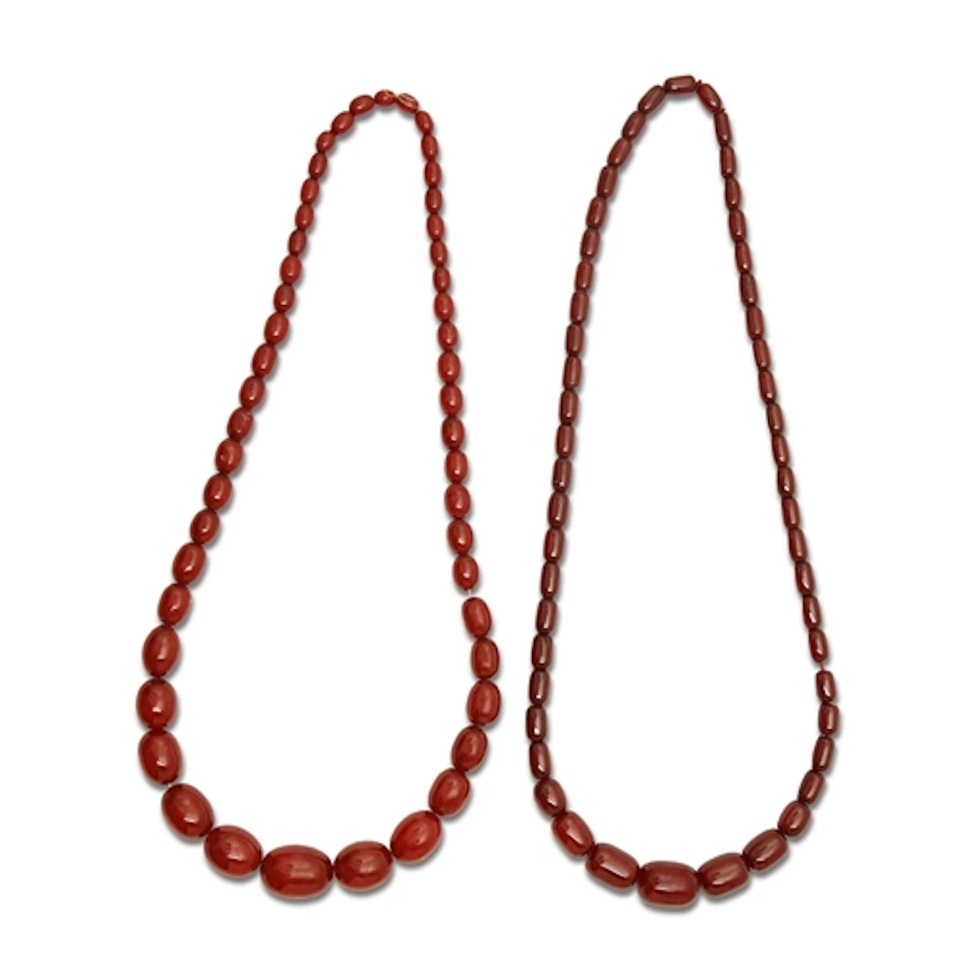 Two necklaces of faturan beads, 184g