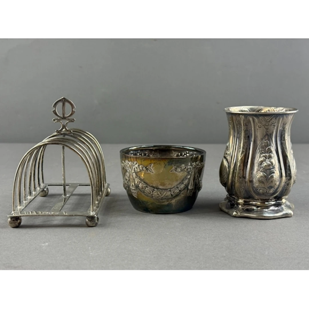 Silver: a six slice toast rack by William Hutton, London 189...