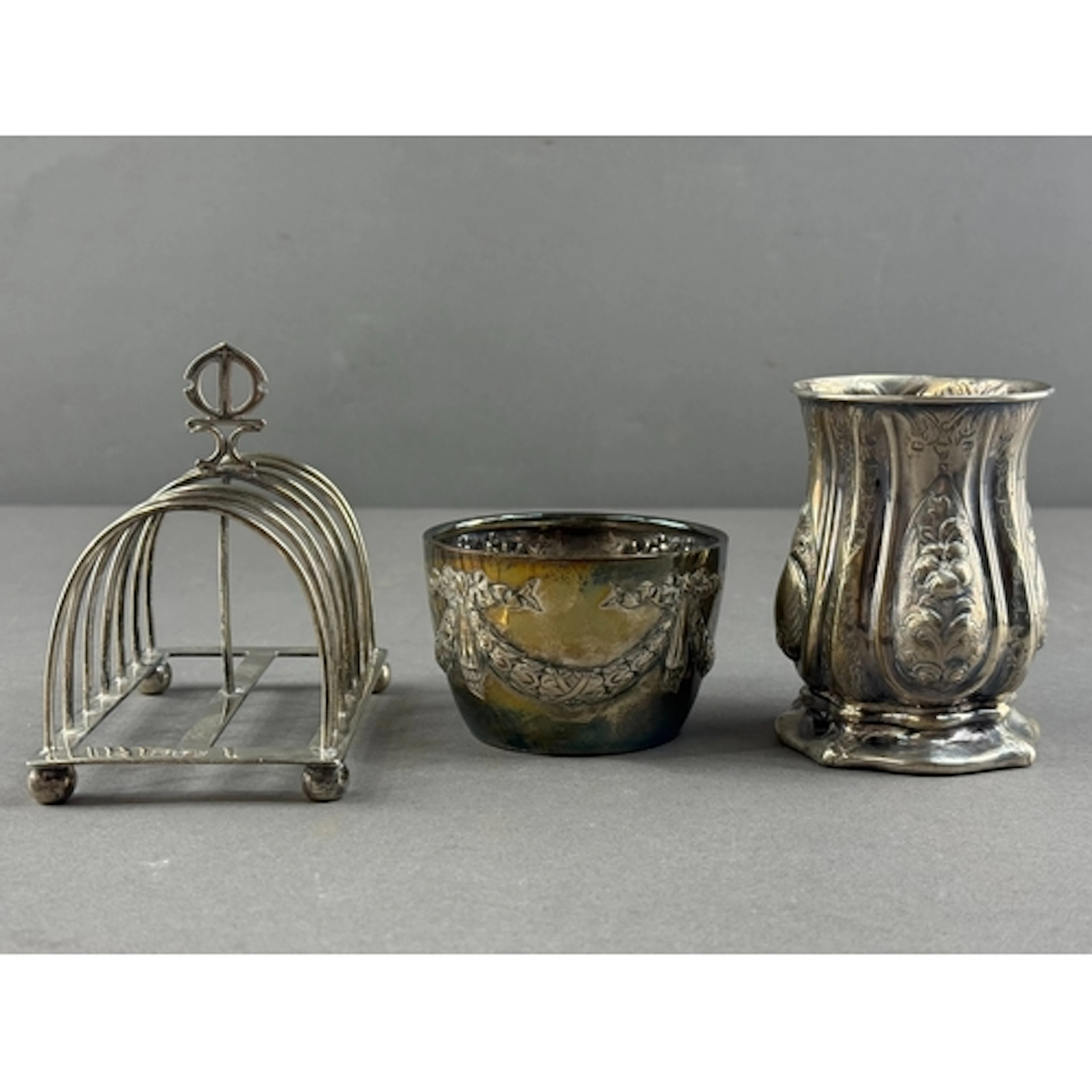 Silver: a six slice toast rack by William Hutton, London 189...