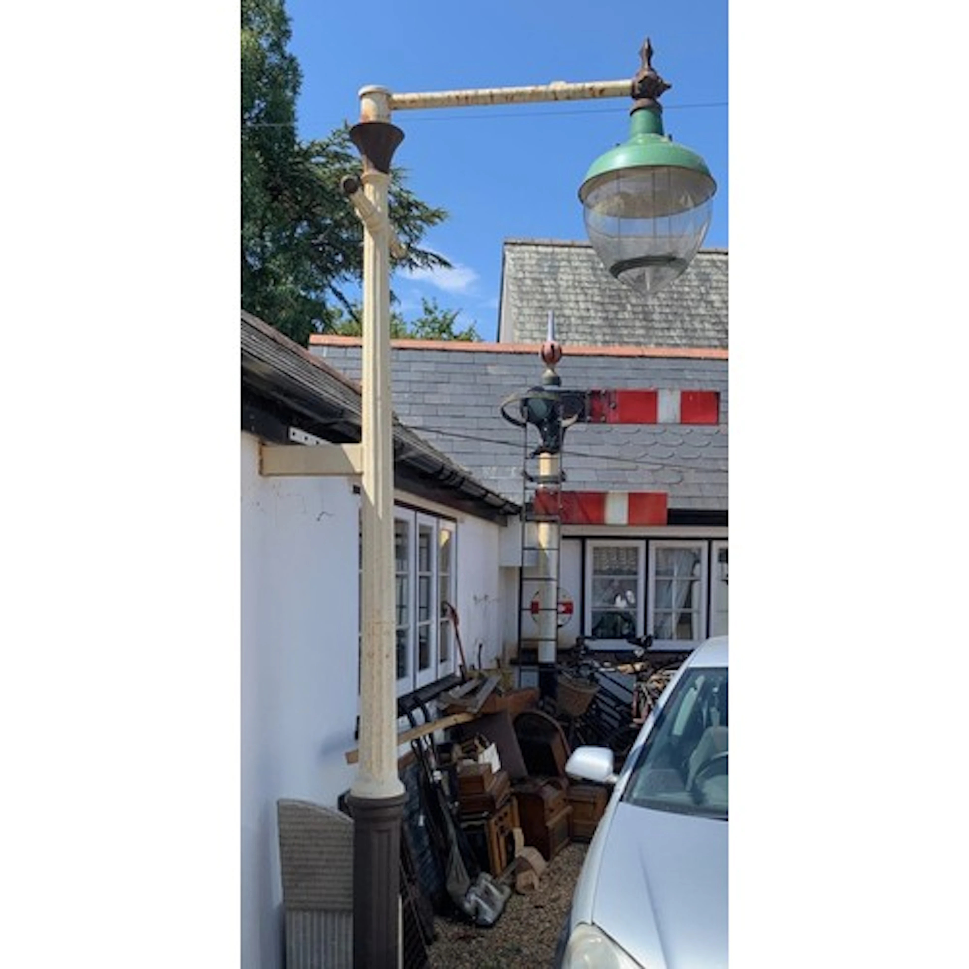 A VINTAGE CAST-IRON LAMP POST BY WILLEY & CO. EXETER LAT...