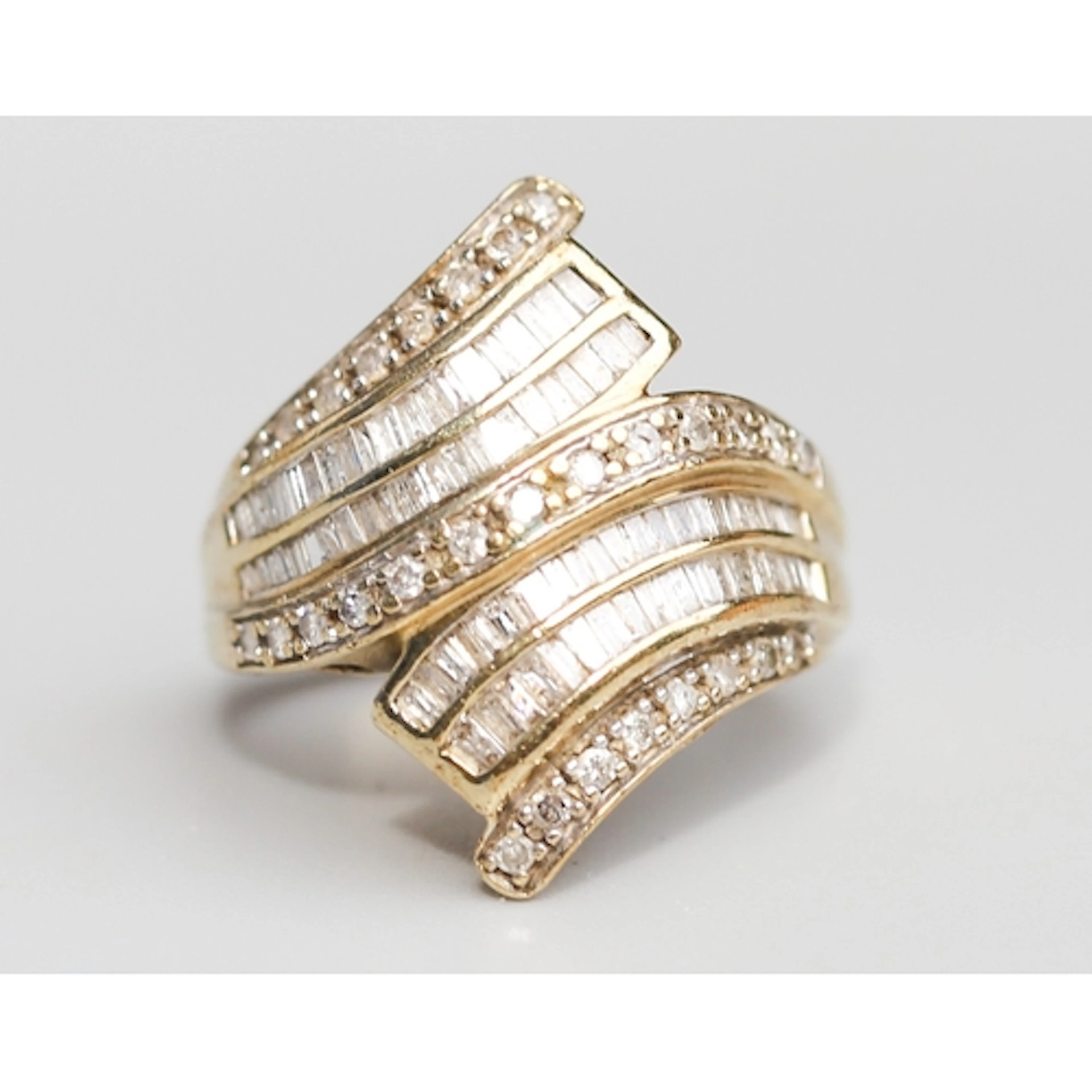 Round Cut and Tapered Baguette Cut Diamond Cluster Set Wrap ...