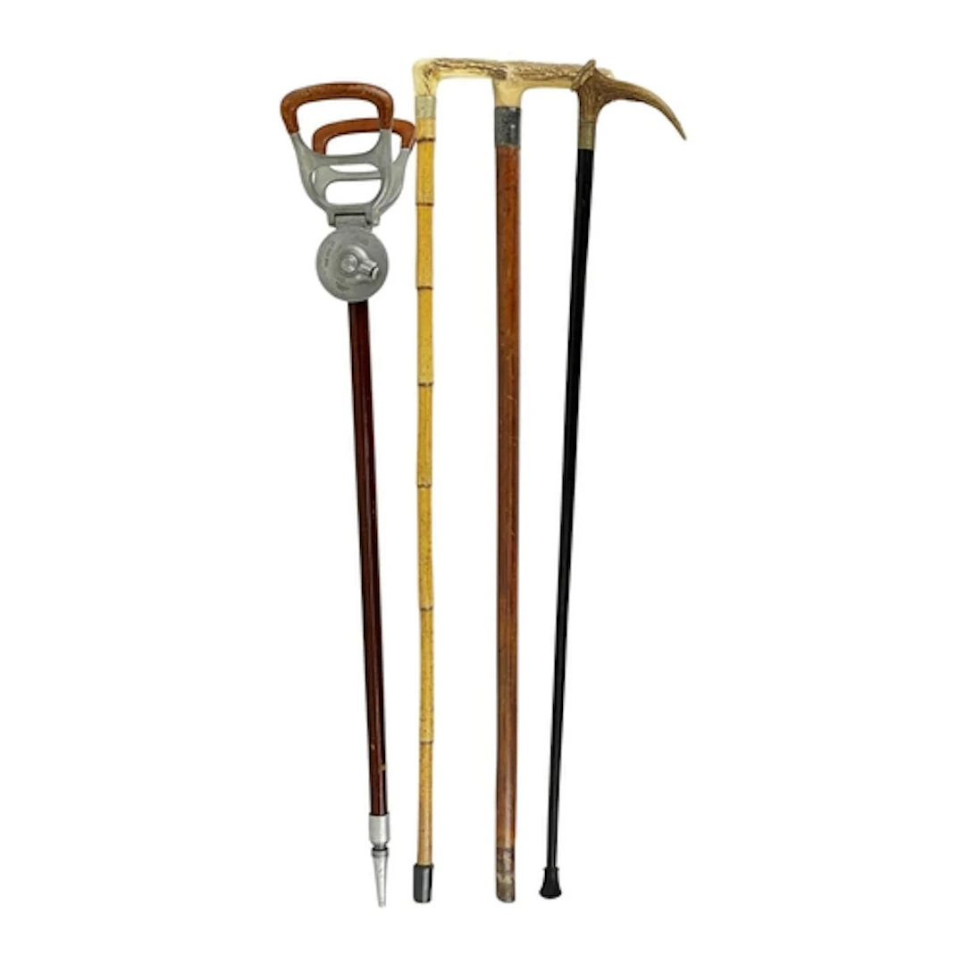 A leather mounted alloy shooting stick. Height 88cm, and thr...