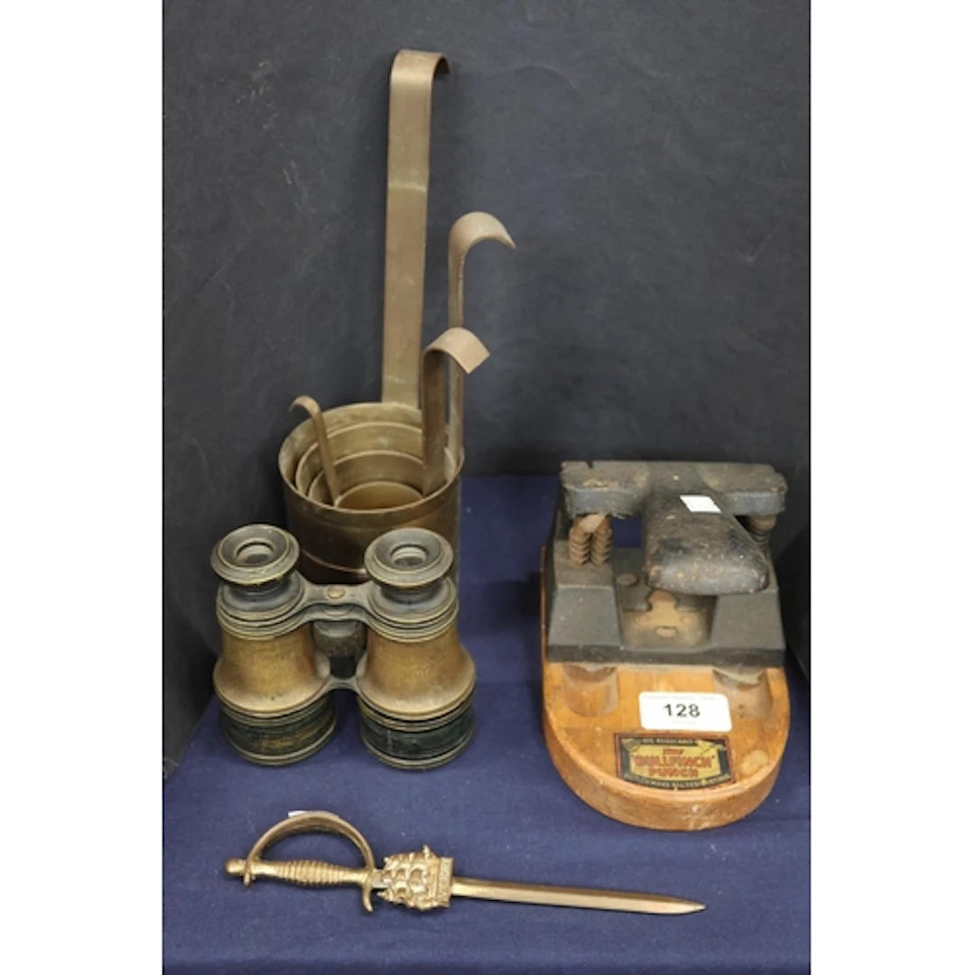 The Bullfinch punch, a pair of binoculars, a letter opener a...