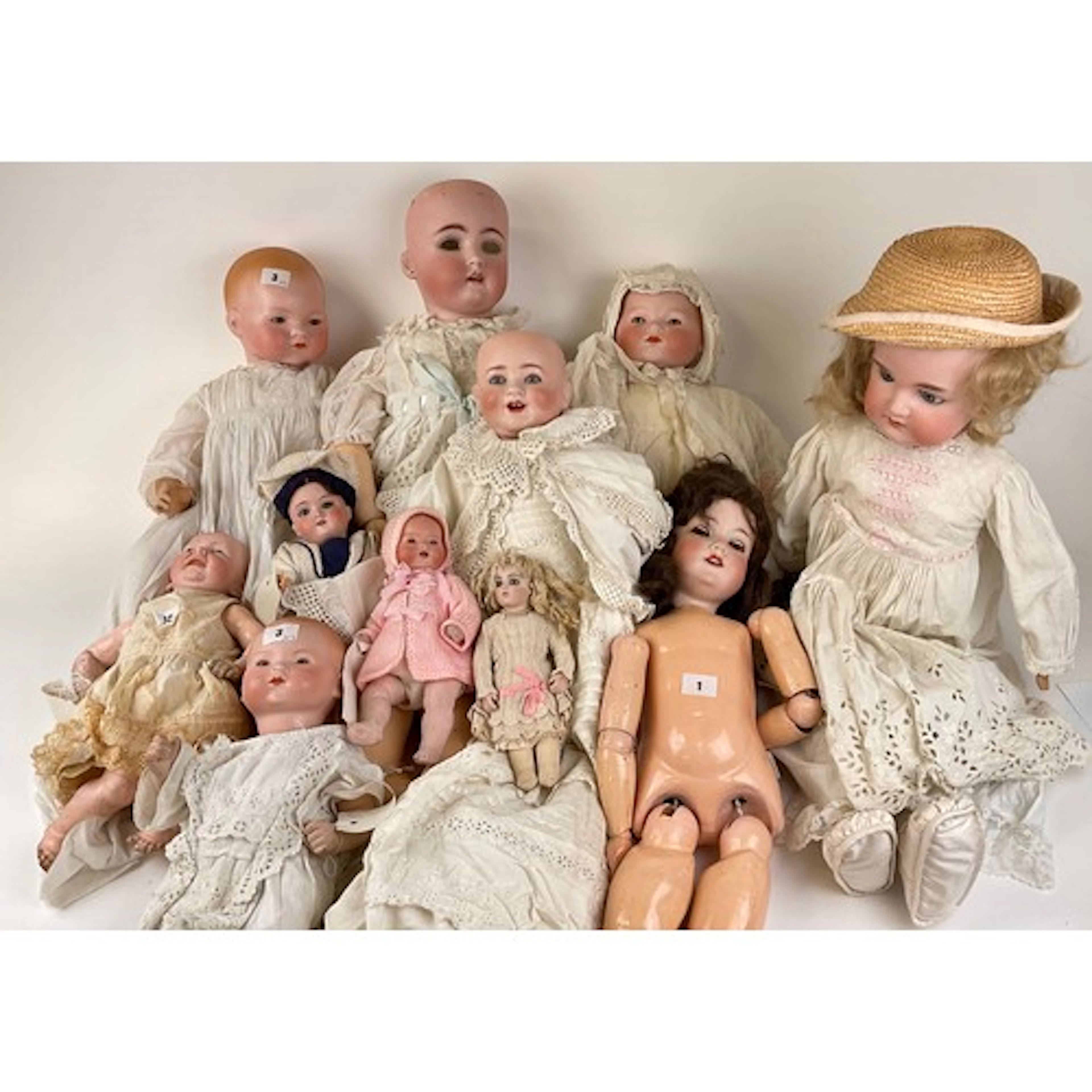 Dolls - a mid 20th century bisque headed, soft bodied doll, ...