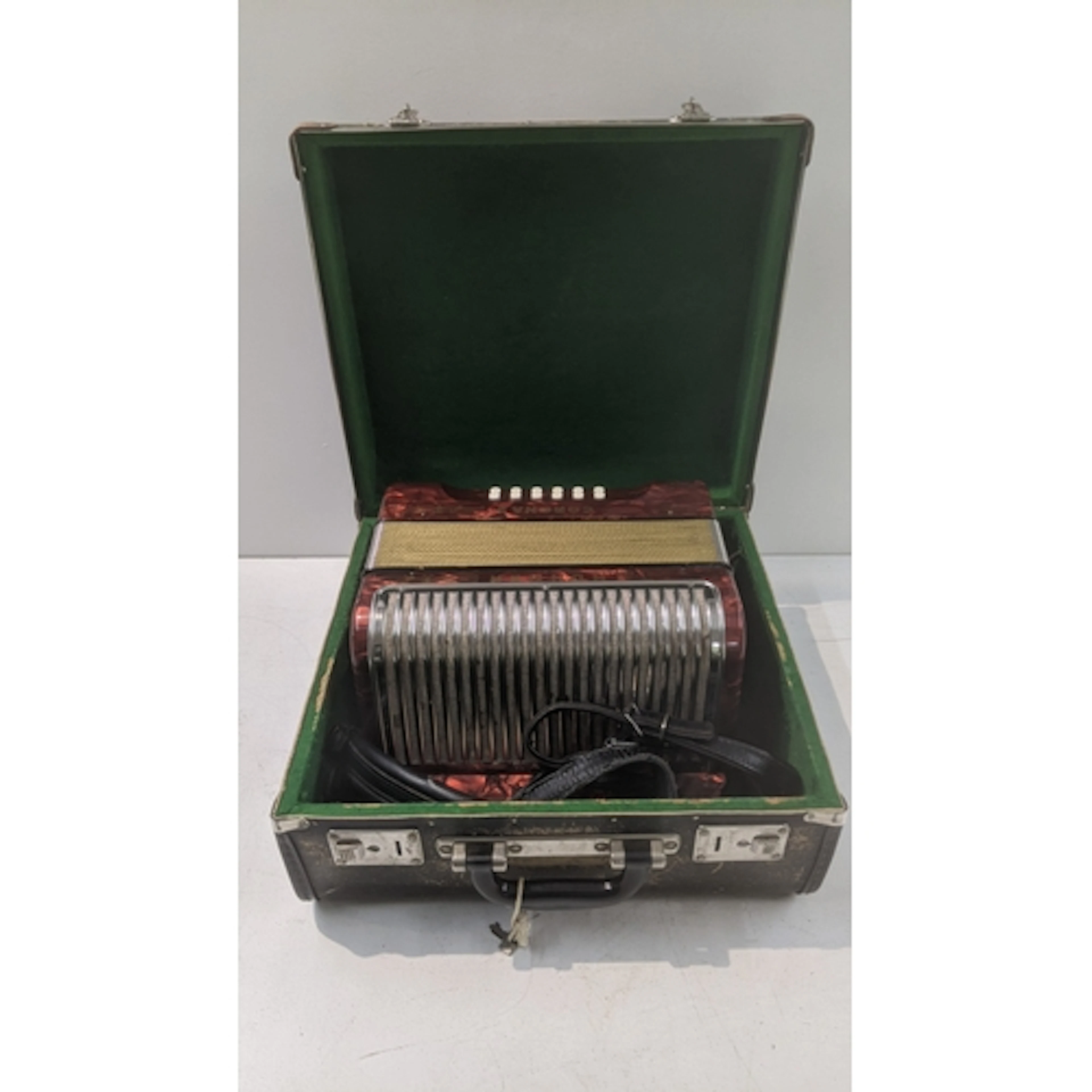 A Hohner Corona 2 Accordion in a vintage carry case Location...