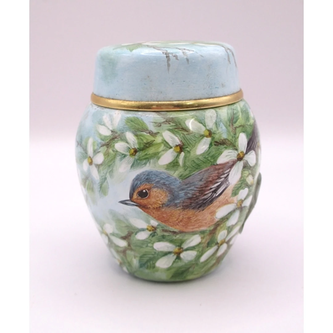 Miniature Moorcroft enamel jar and cover, decorated with cha...