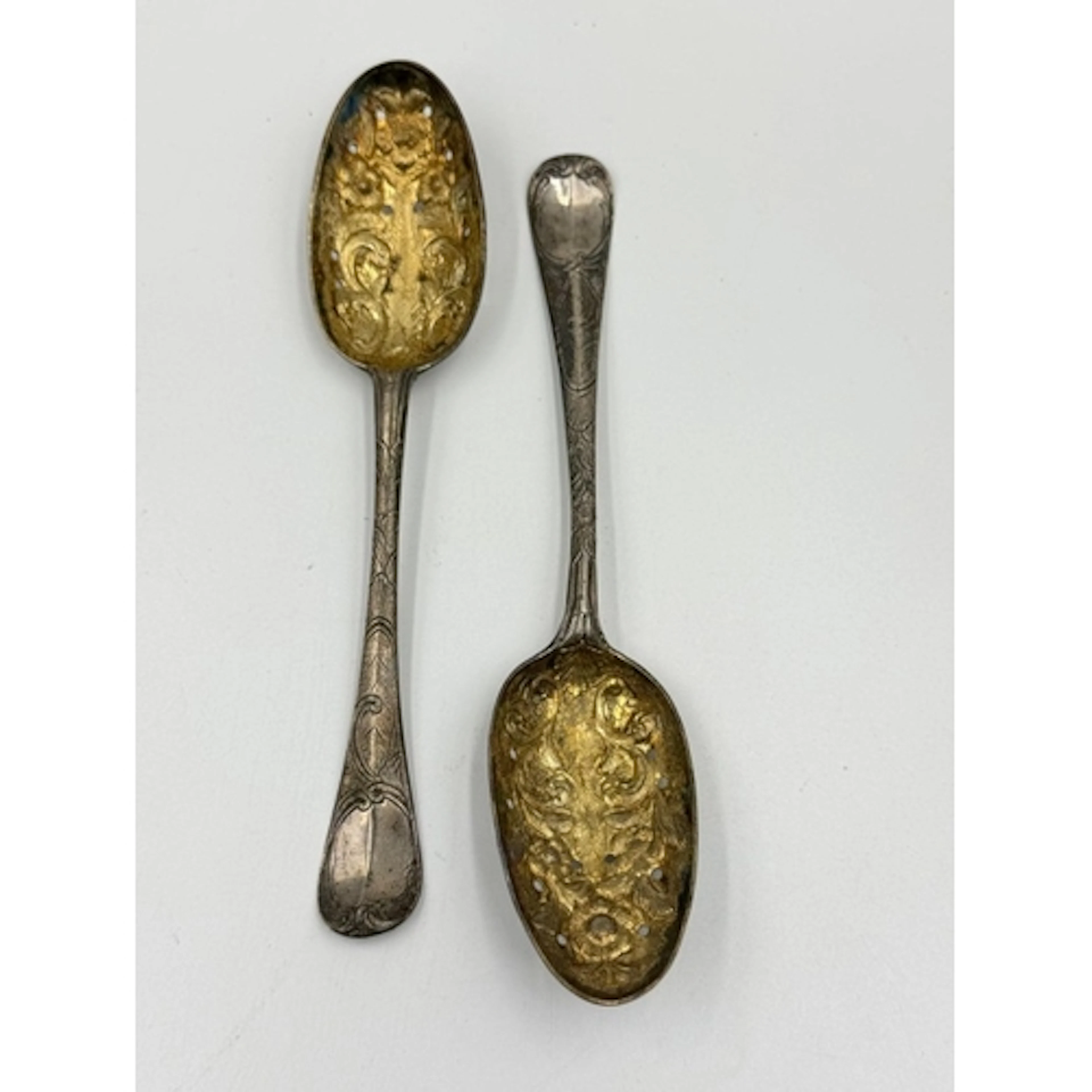 A pair of hallmarked silver berry spoons