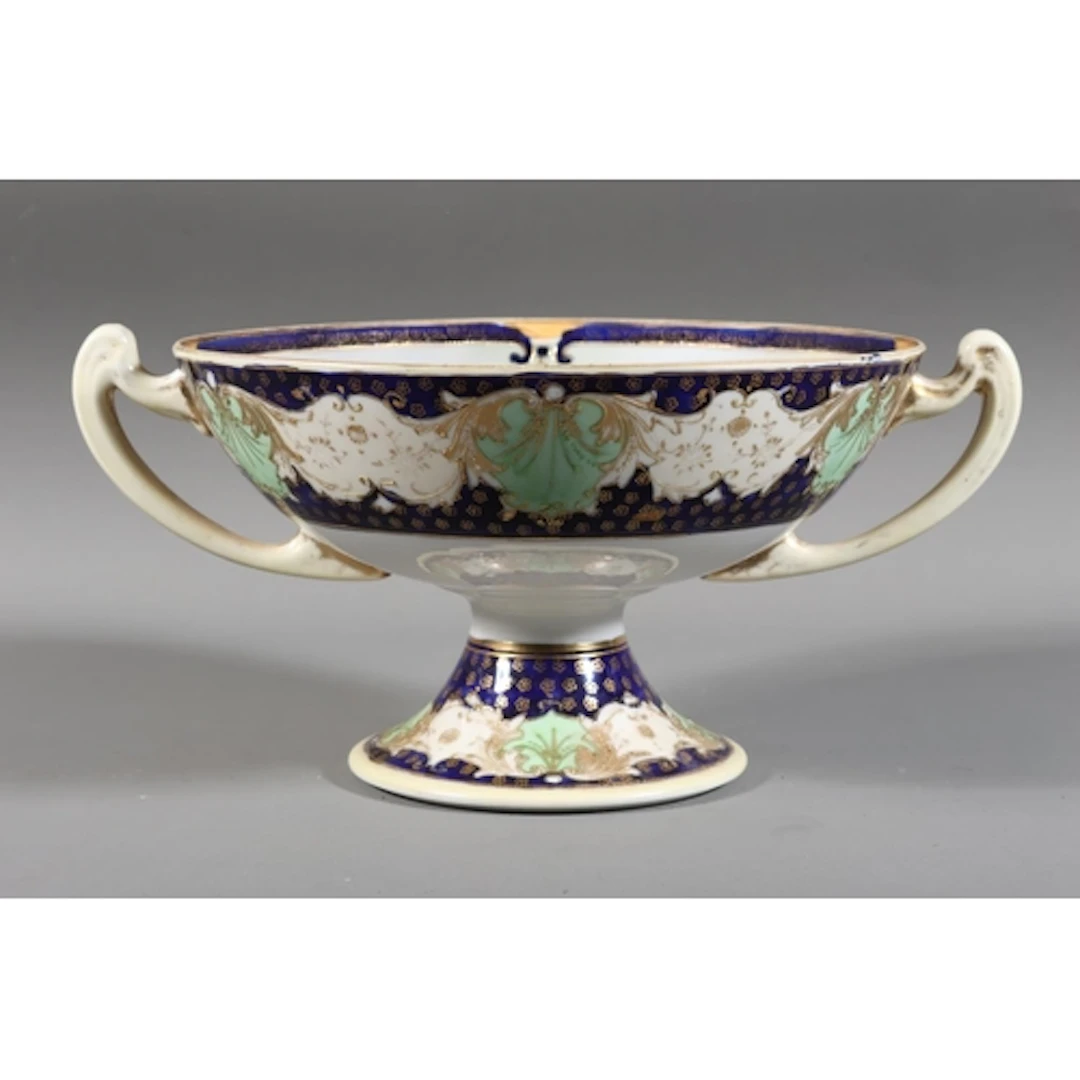 Noritake twin-handled tazza decorated with countryside river...