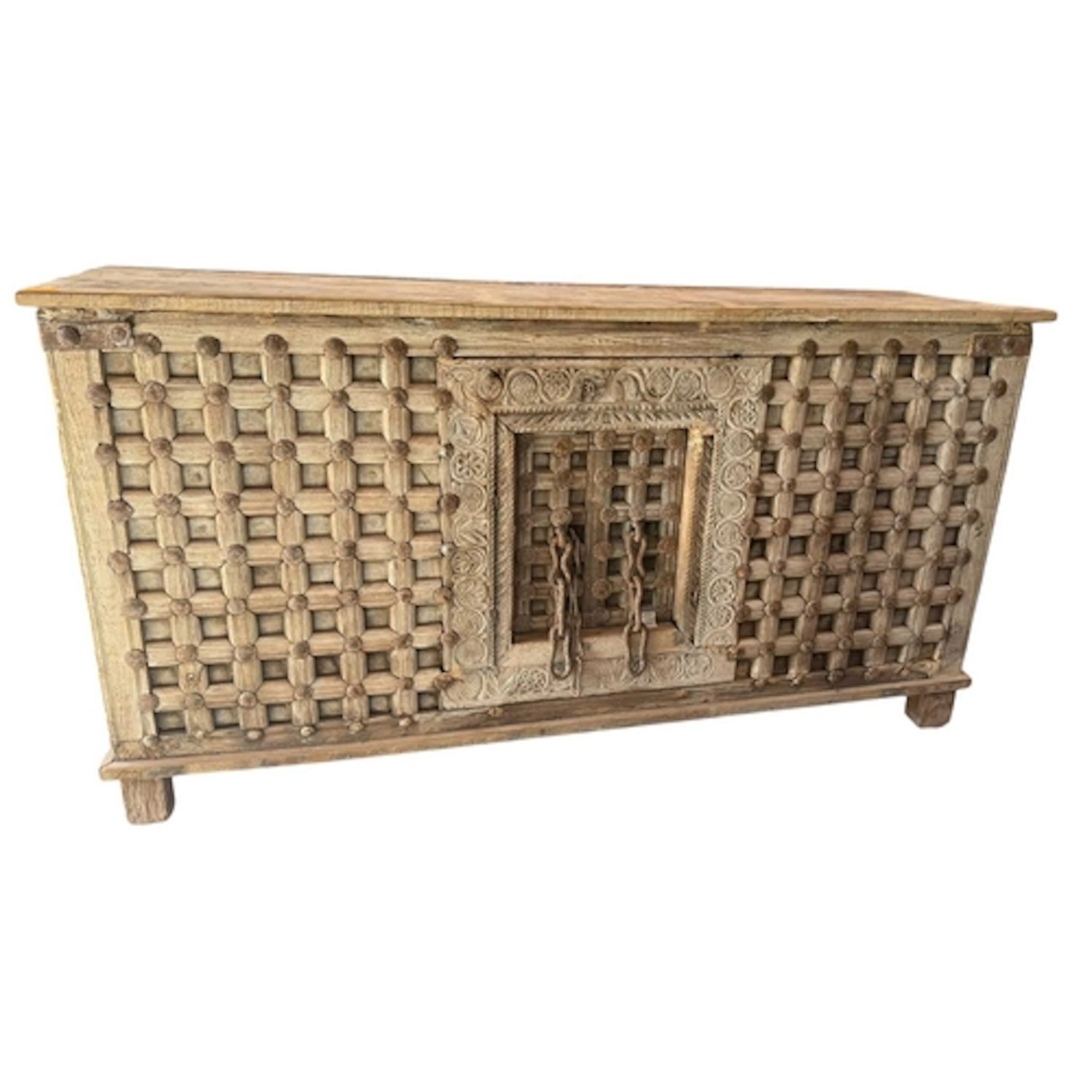 A large Indian, heavily carved teak wood and iron Dowry ches...