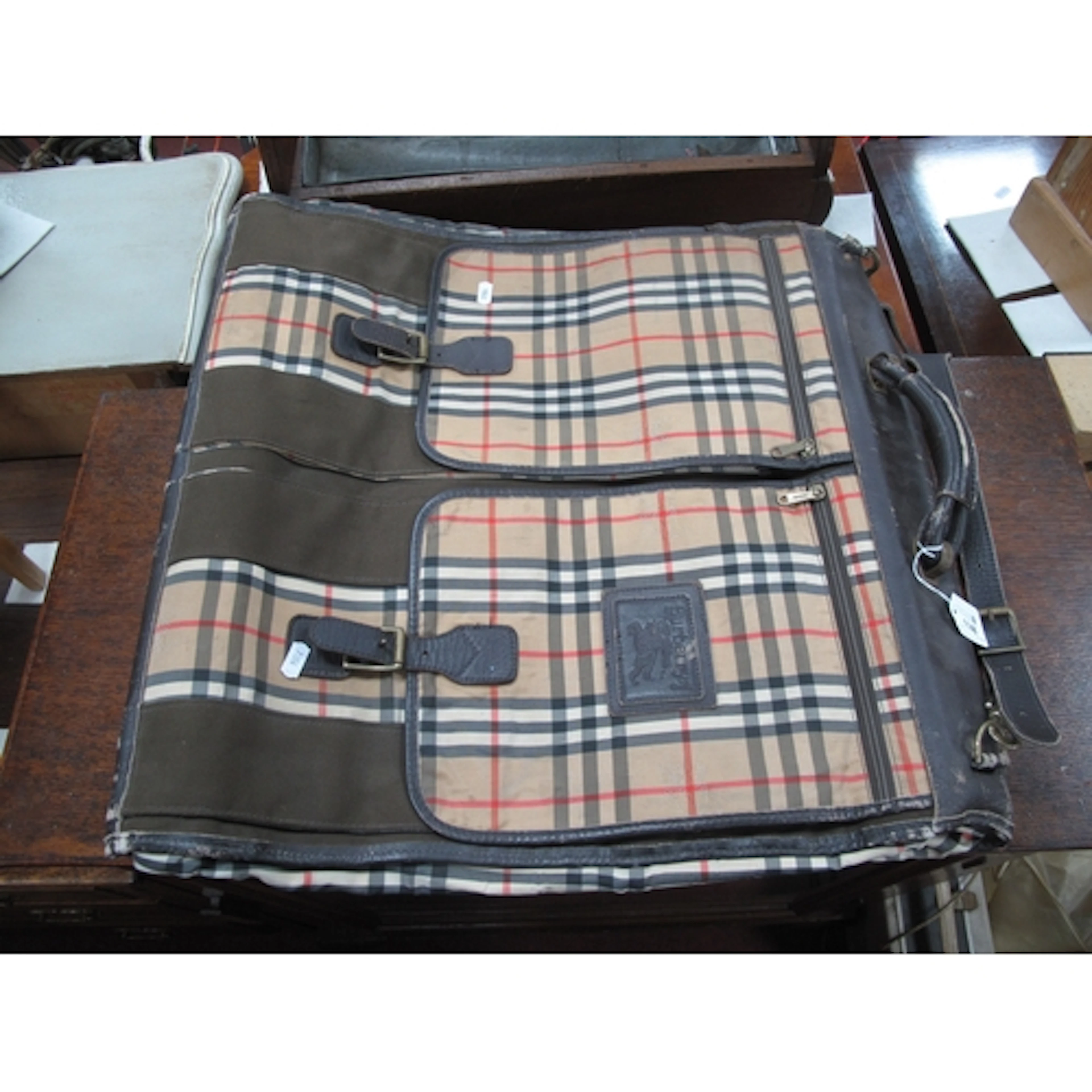 A Vintage Burberrys Suit Carrier, with multi inner and outer...