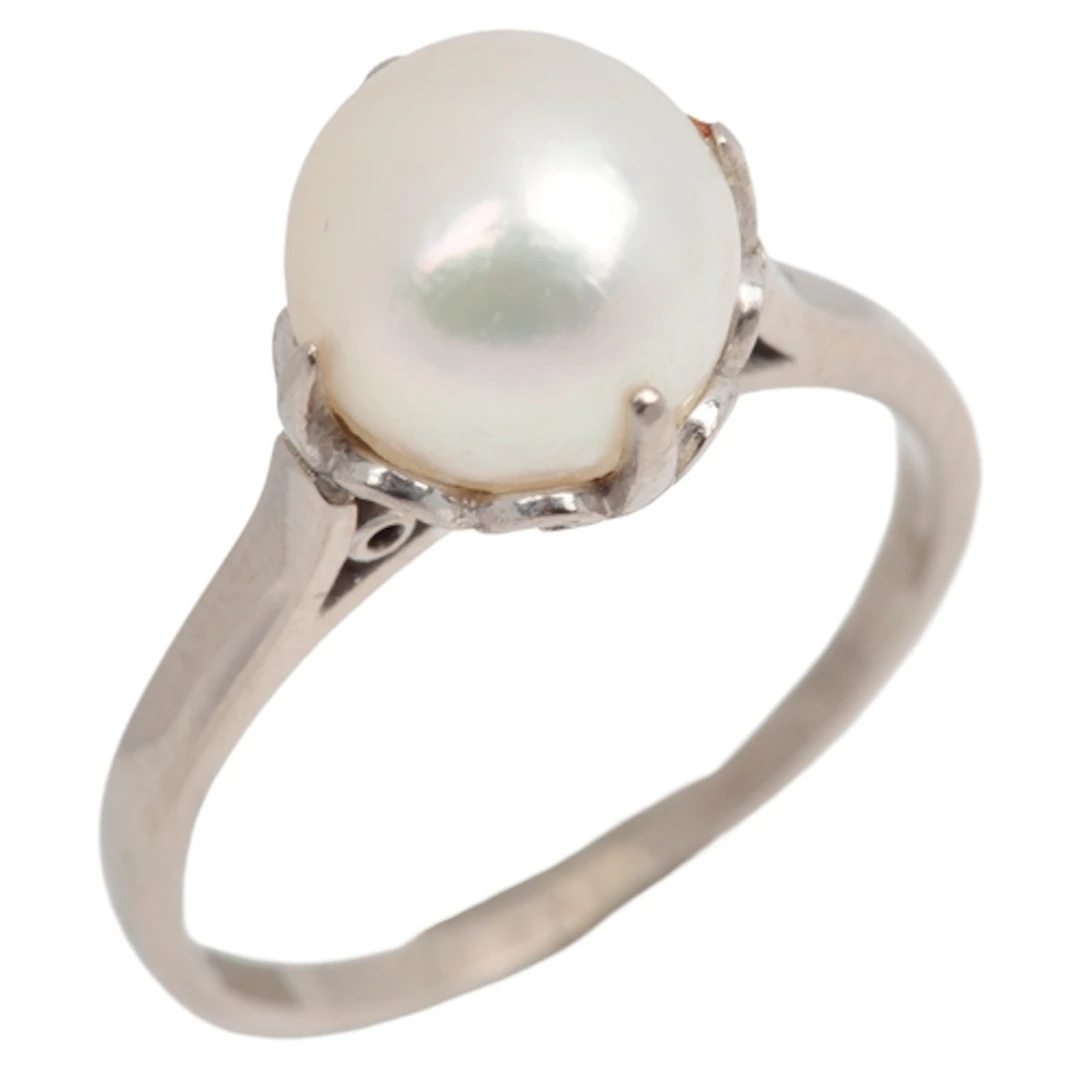 Mikimoto, a cultured pearl ring, claw-set with a cultured pe...