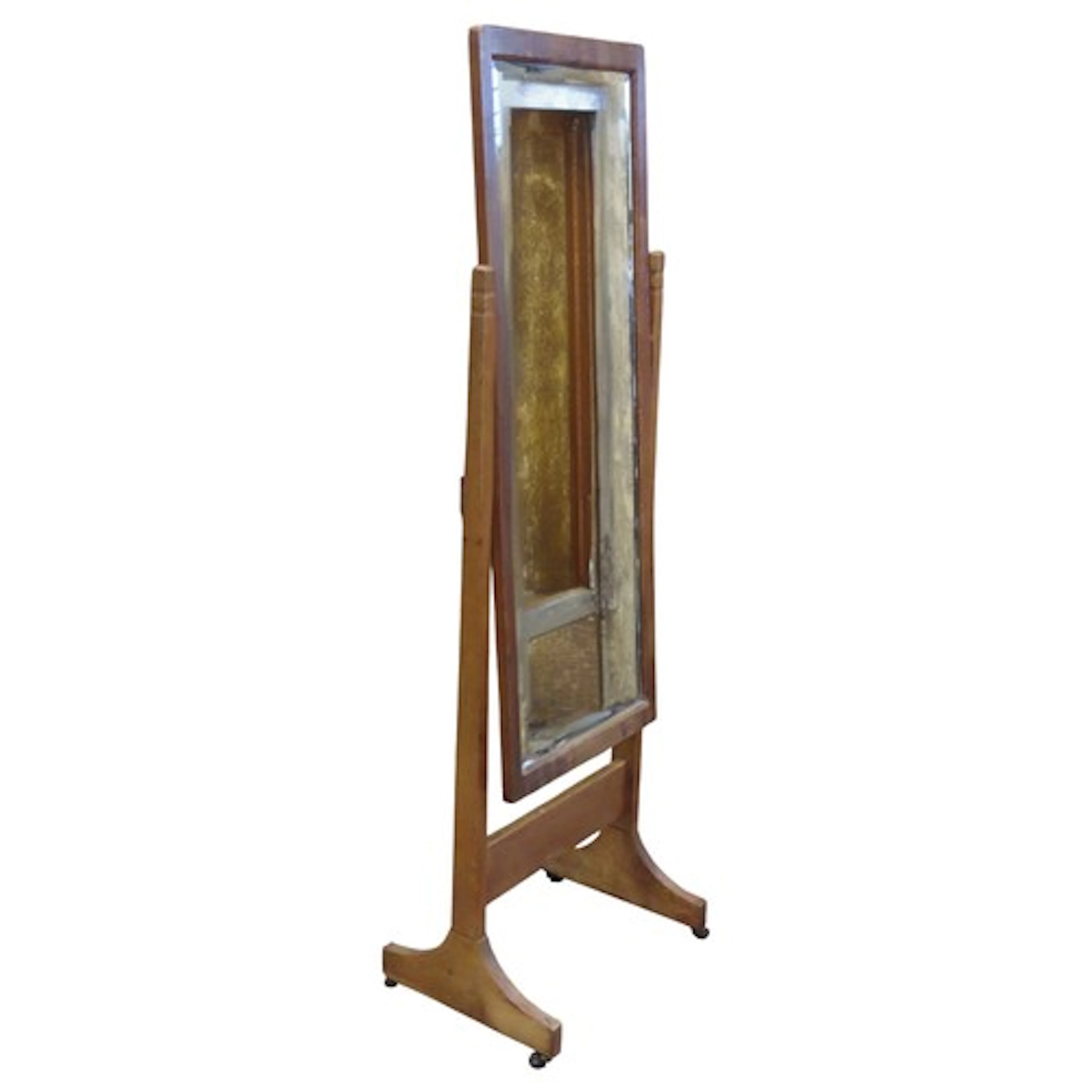 An Arts & Crafts style oak cheval mirror with rectangular be...