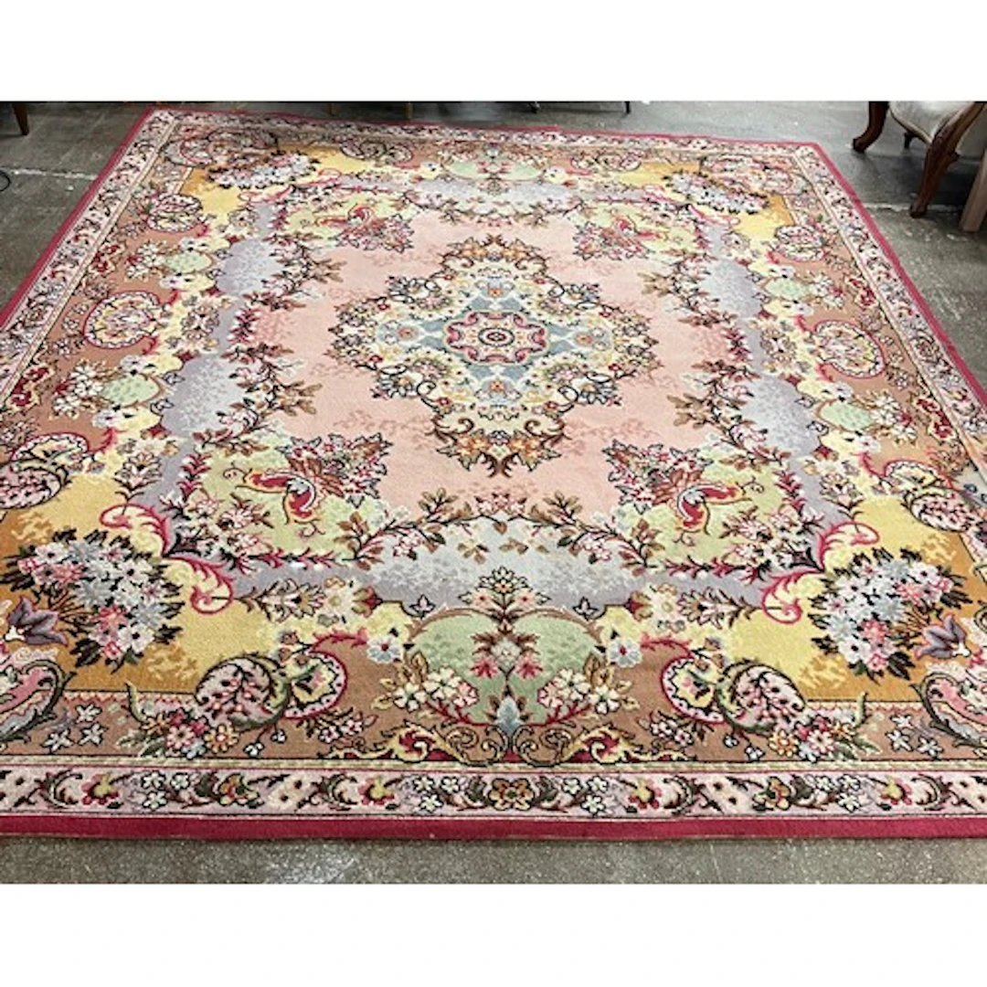 Rectangular floral patterned rug.
