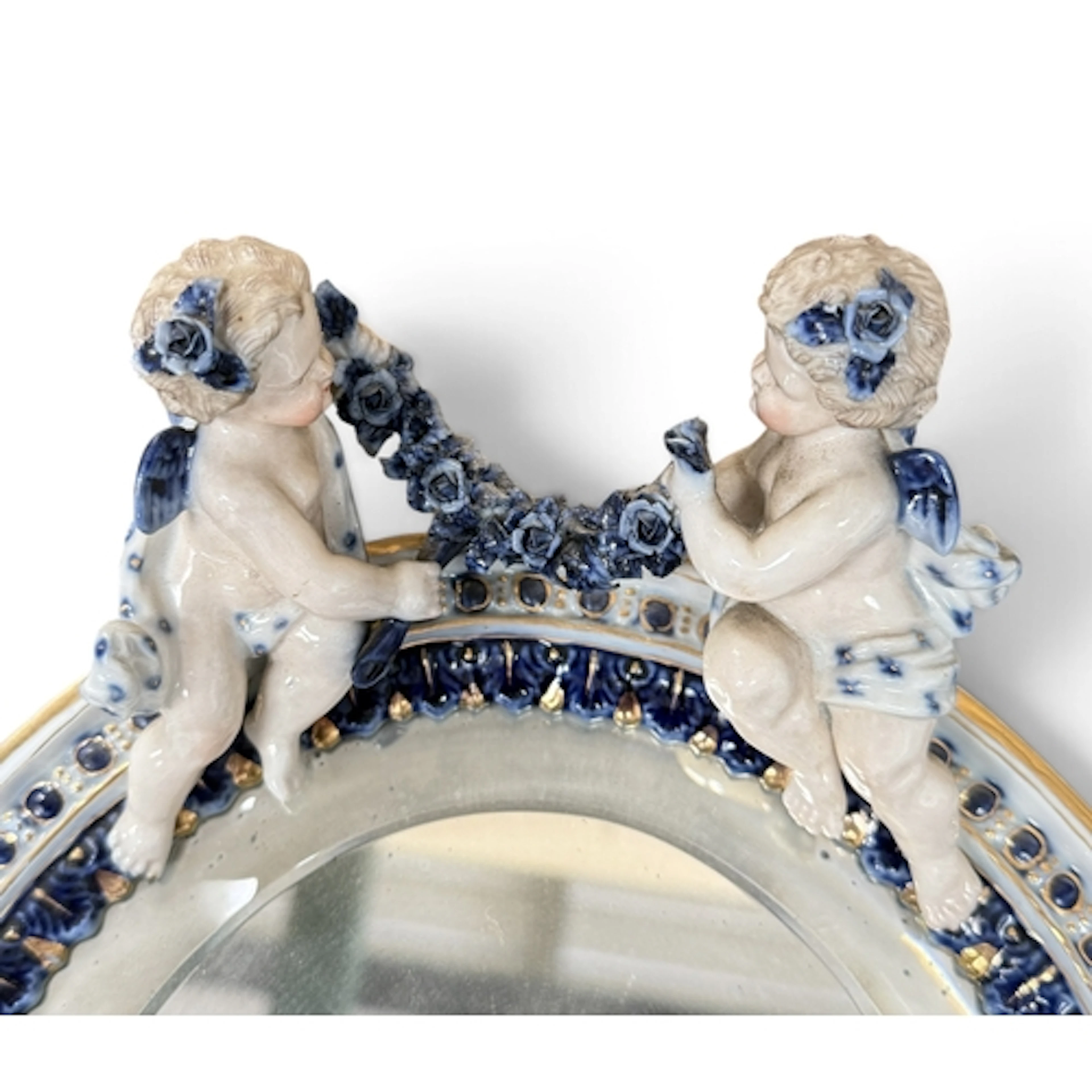 A GERMAN PORCELAIN MIRROR 32 x 25 cm.