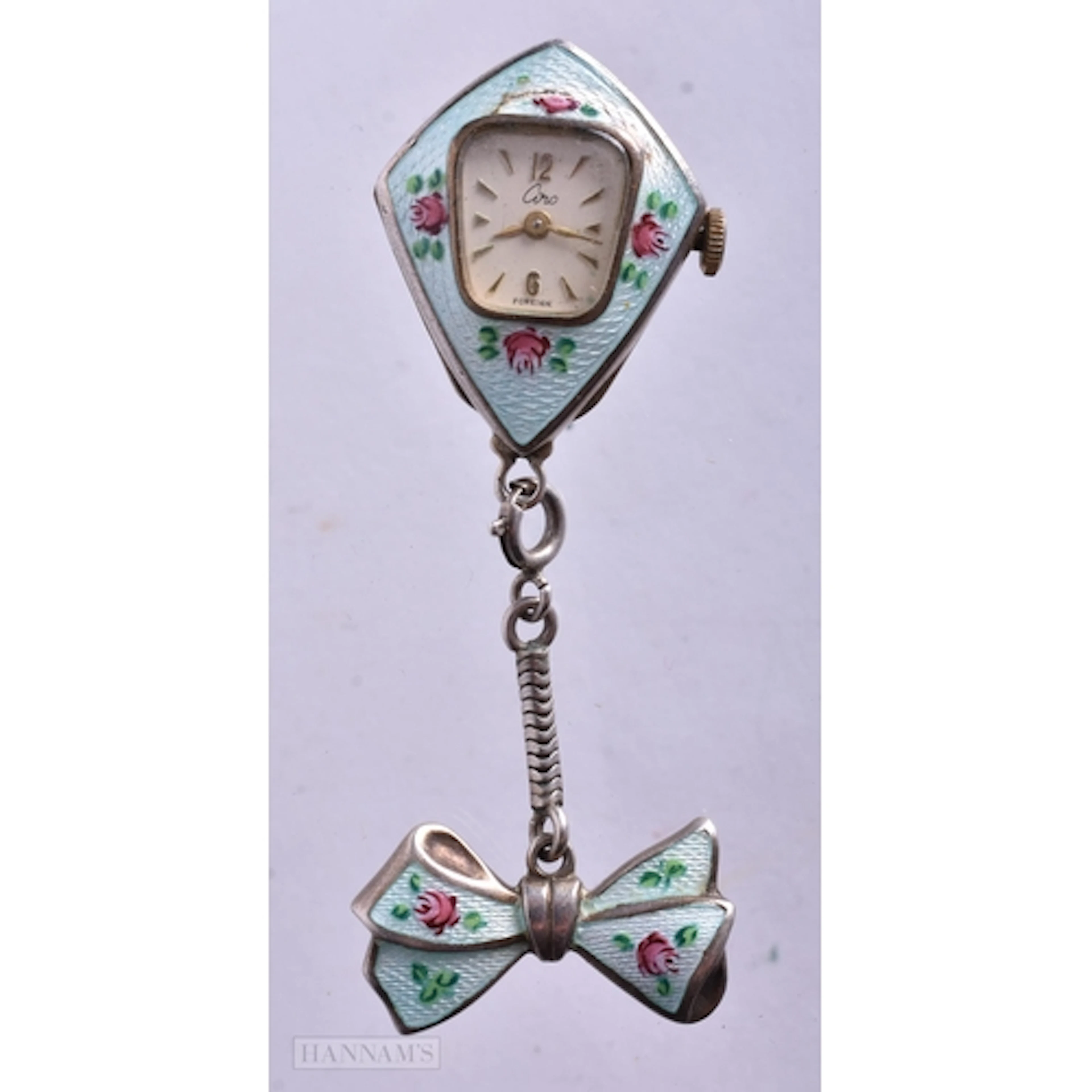 AN ART DECO SILVER AND ENAMEL PENDANT BROOCH. Running. 6 cm ...
