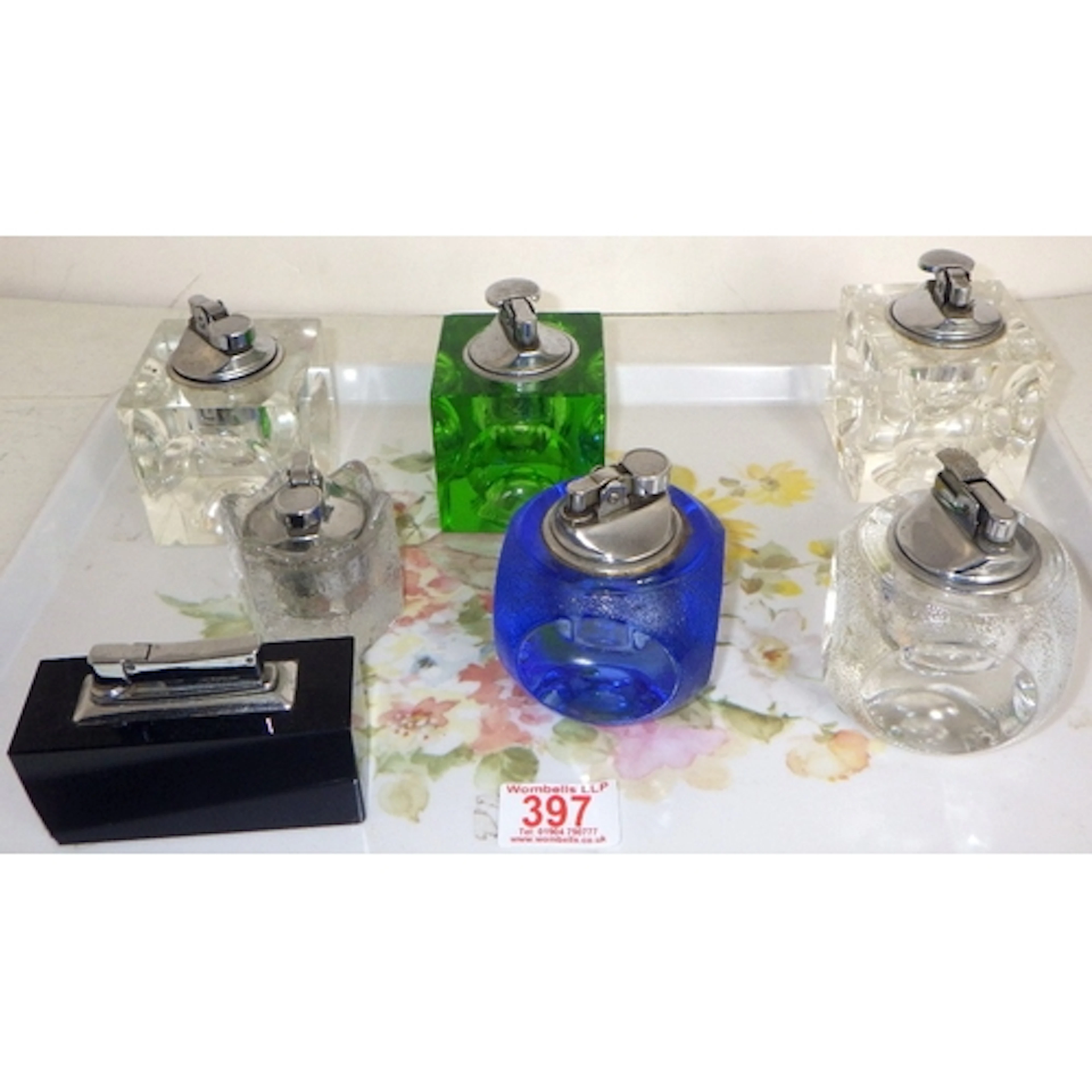 A group of misc table lighters