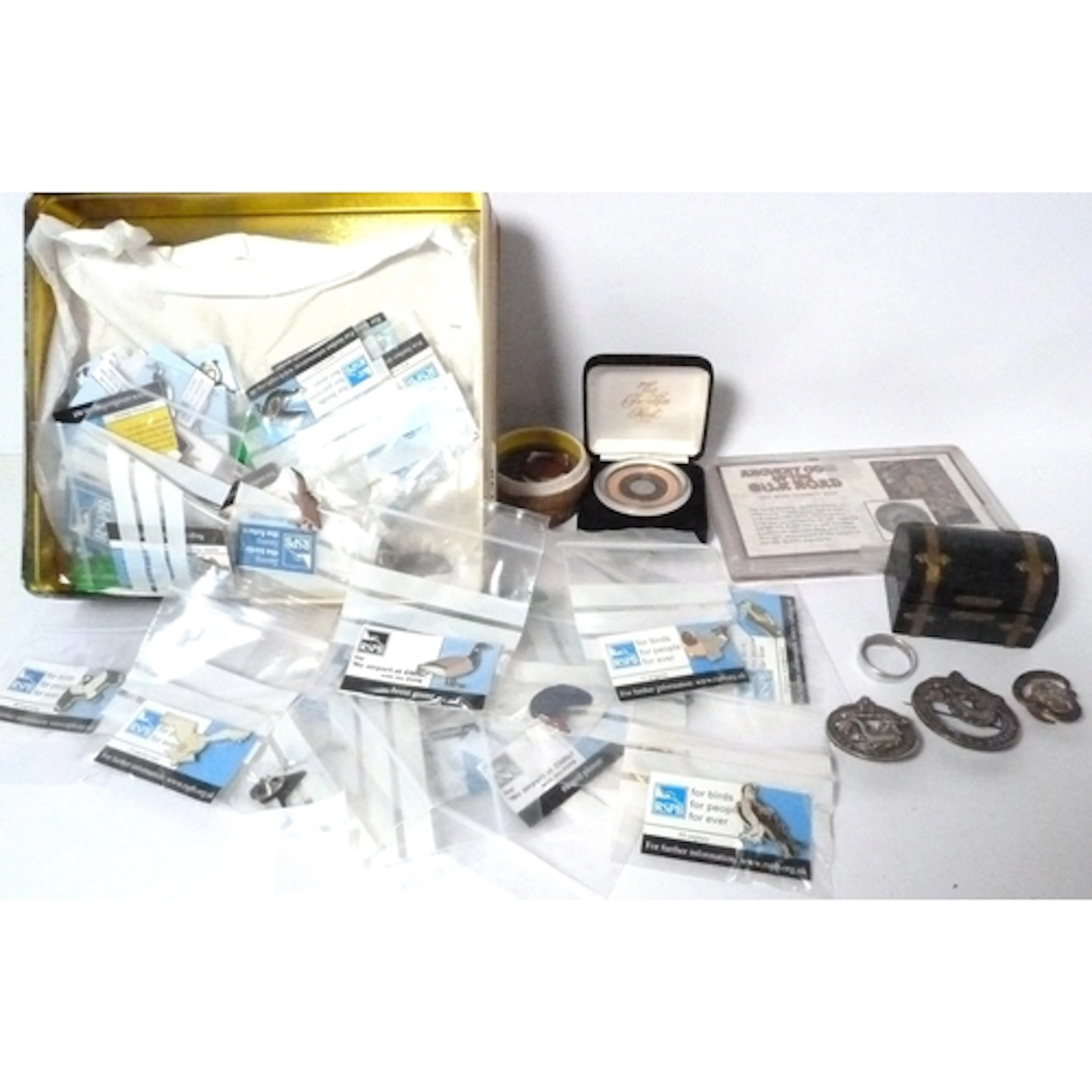 Collection of coins and lapel badges to include Chinese Taoi...