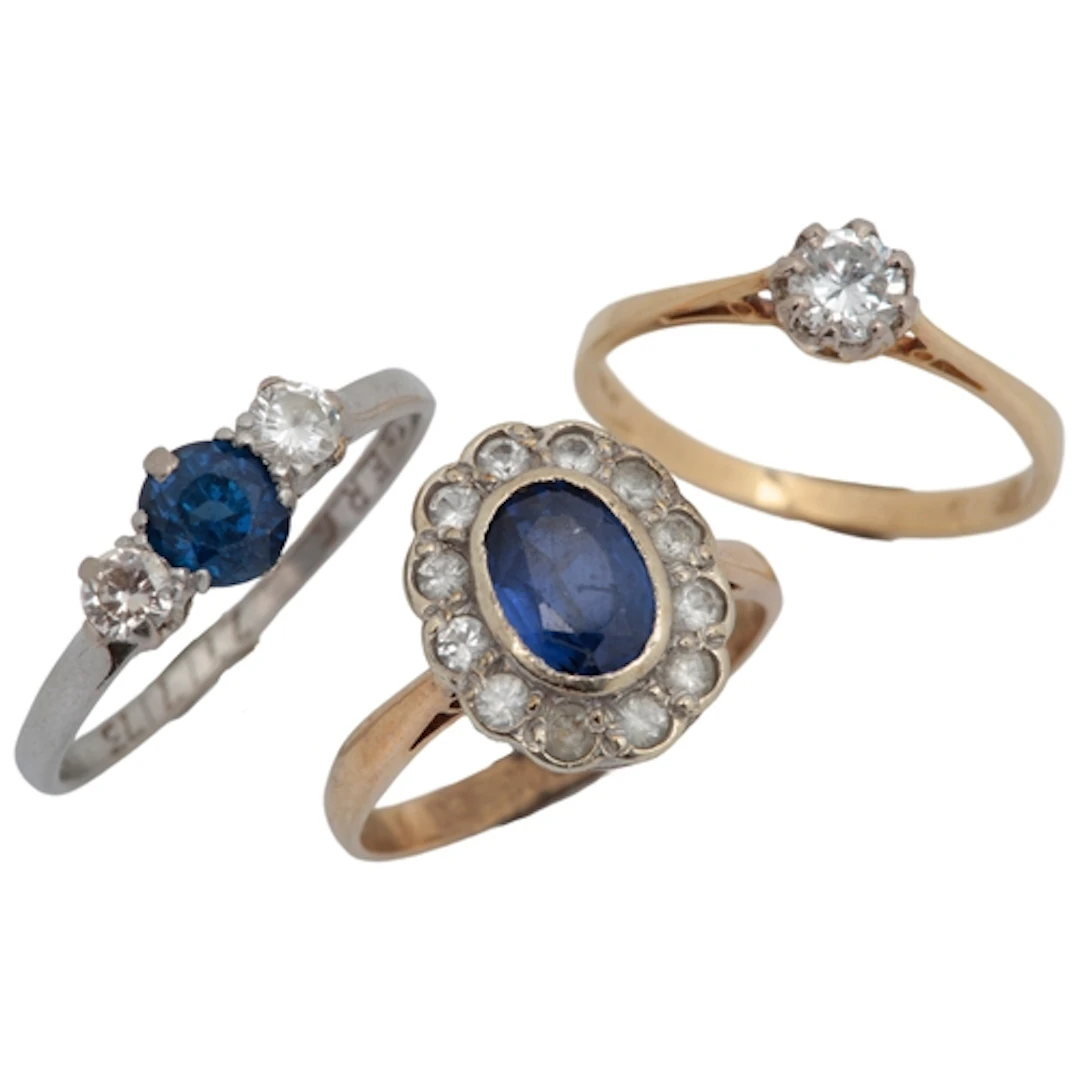 Three gem-set rings, comprising: sapphire and diamond ring, ...
