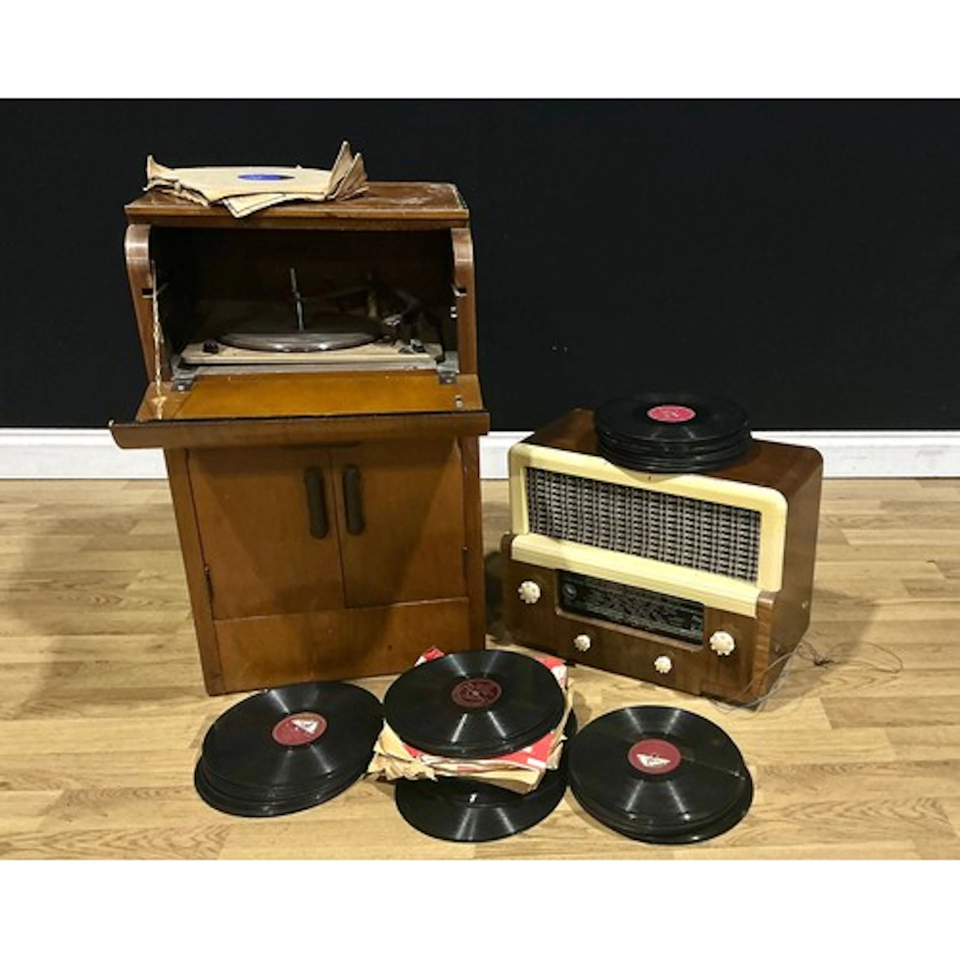 An Art Deco walnut gramophone player, assorted 78s; an Art D...