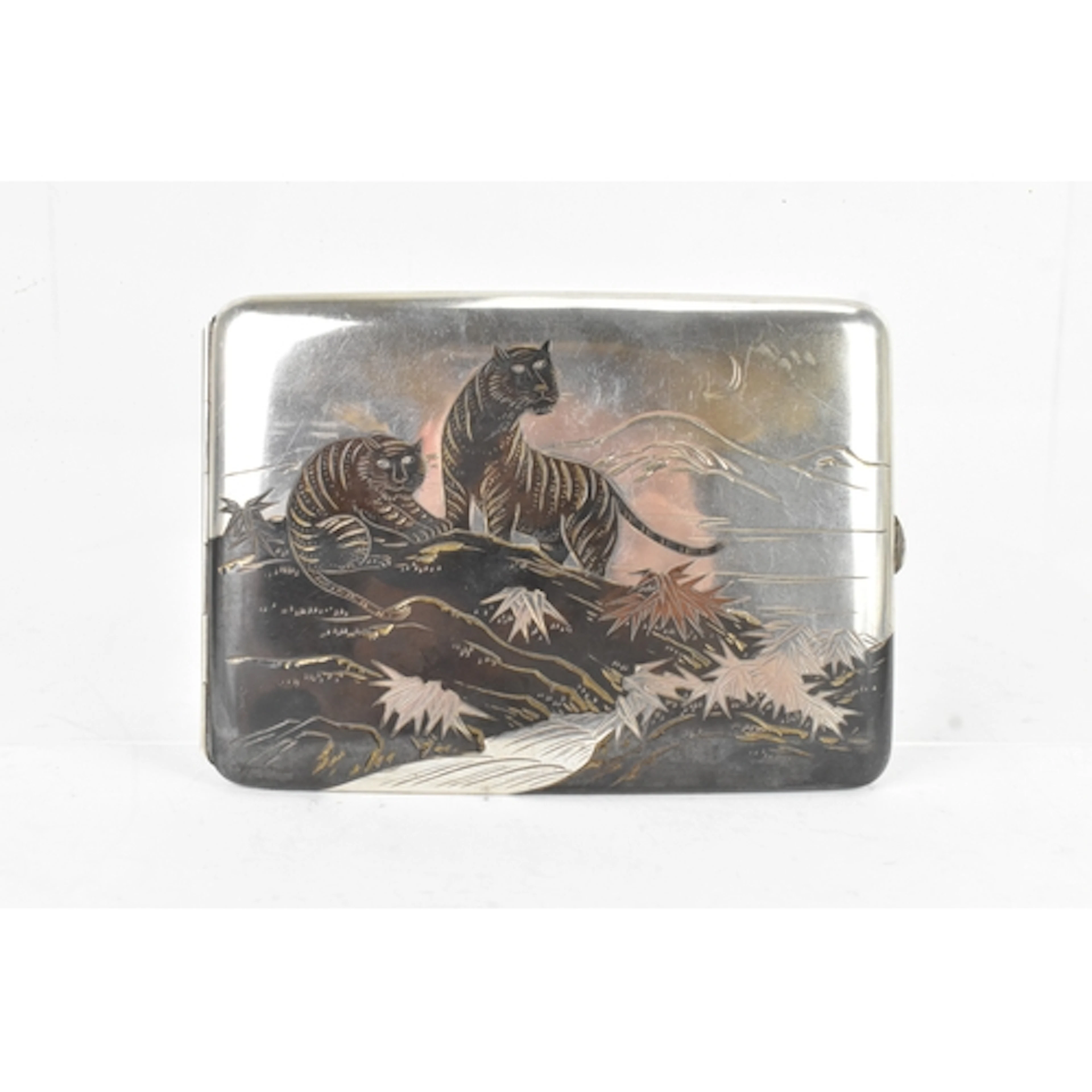 An early 20th century Japanese sterling silver cigarette cas...