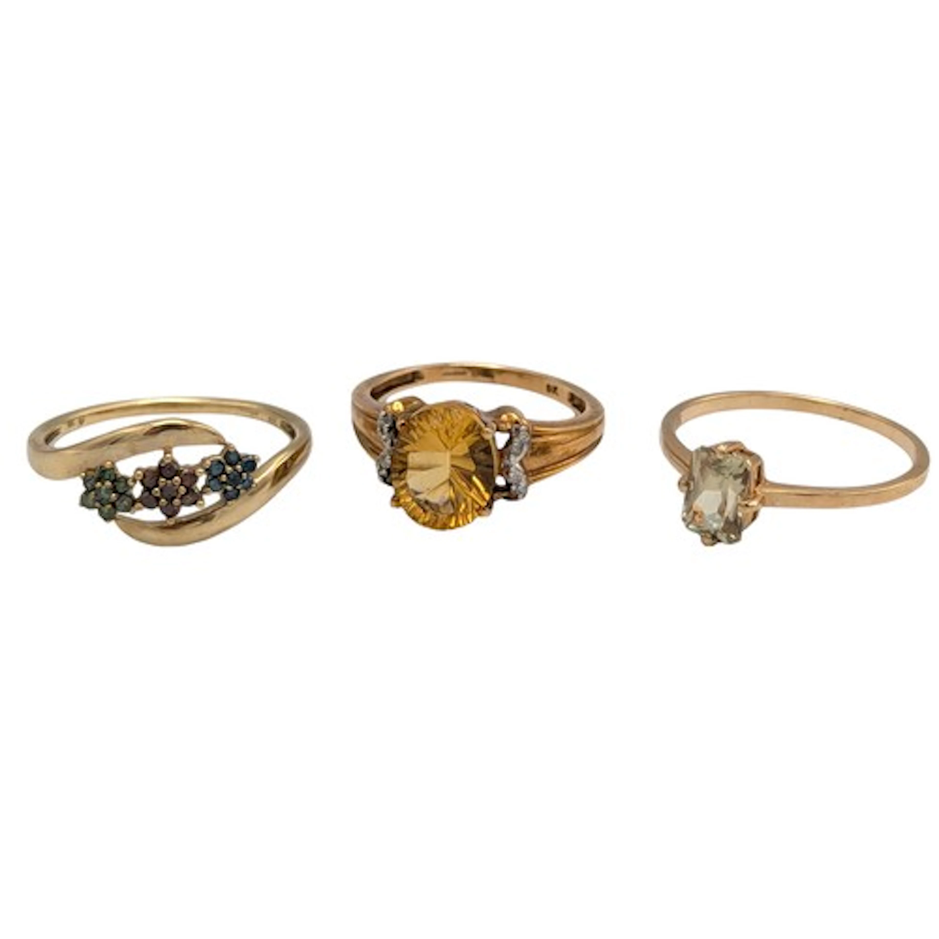 A 9ct gold orange citrine diamond accented dress ring, size ...