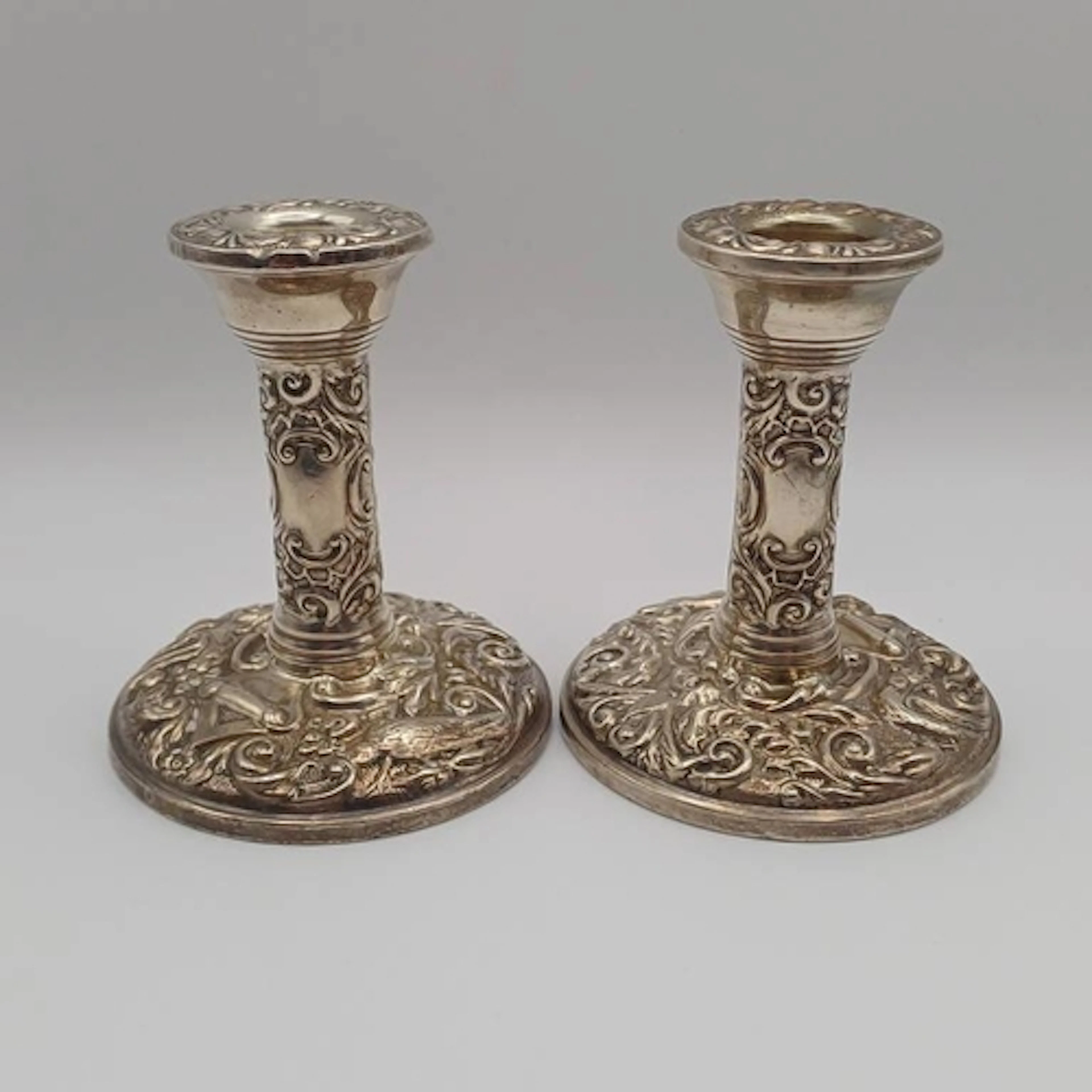 PAIR OF SILVER EMBOSSED CANDLESTICKS, BIRMINGHAM 1960, HEIGH...