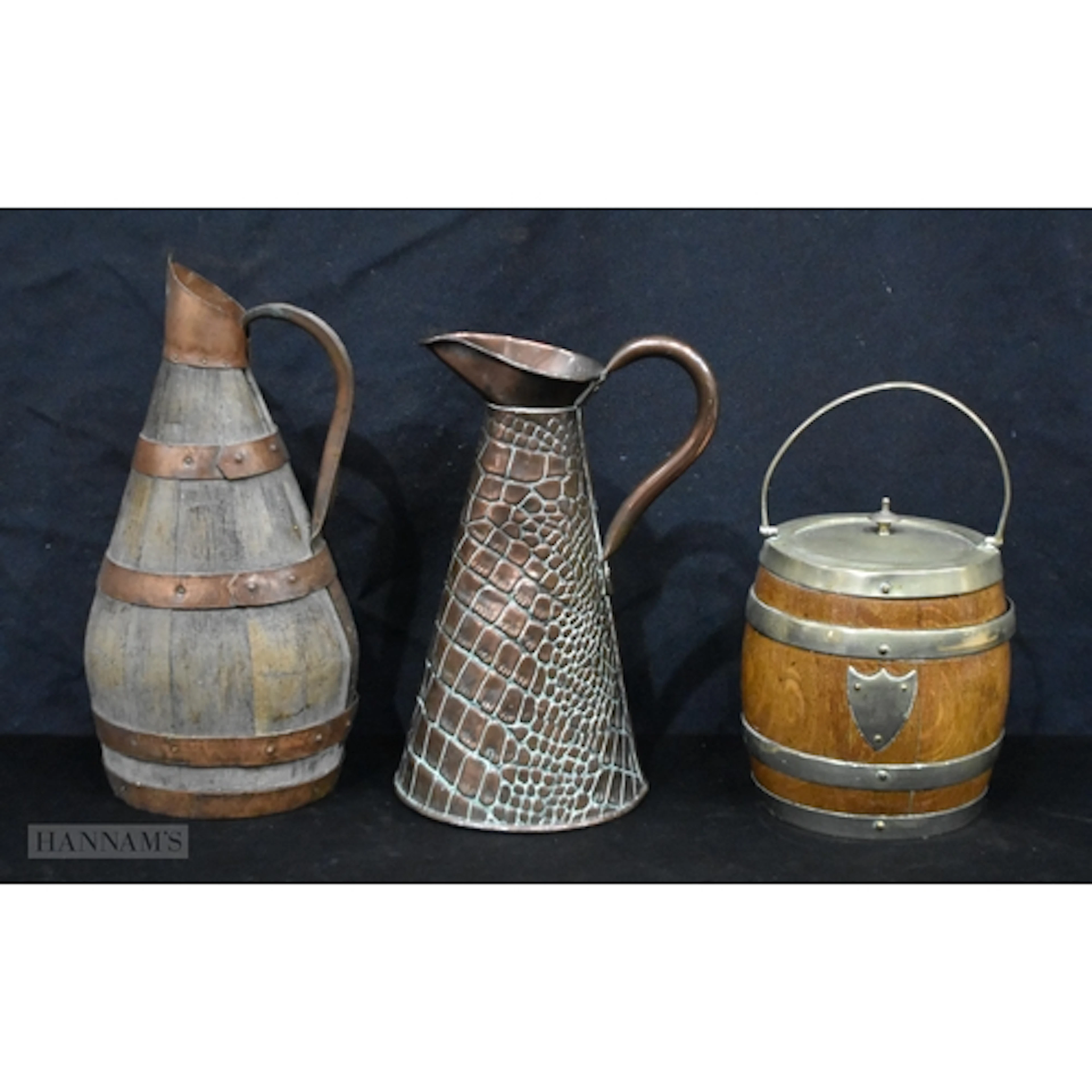 A vintage French copper bound wooden Cider jug together with...