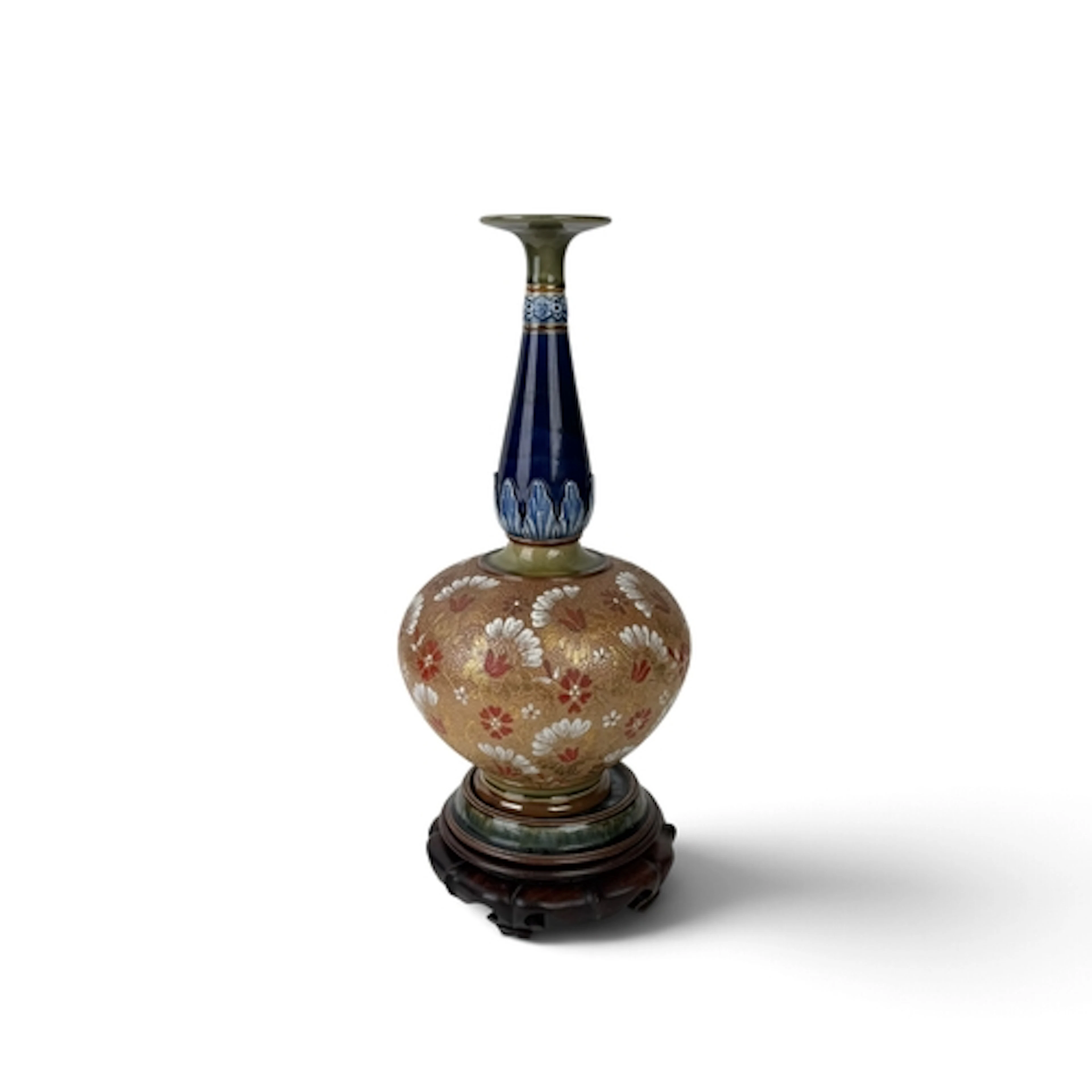 A DOULTON & SLATERS STONEWARE VASE On a Royal Doulton ci...