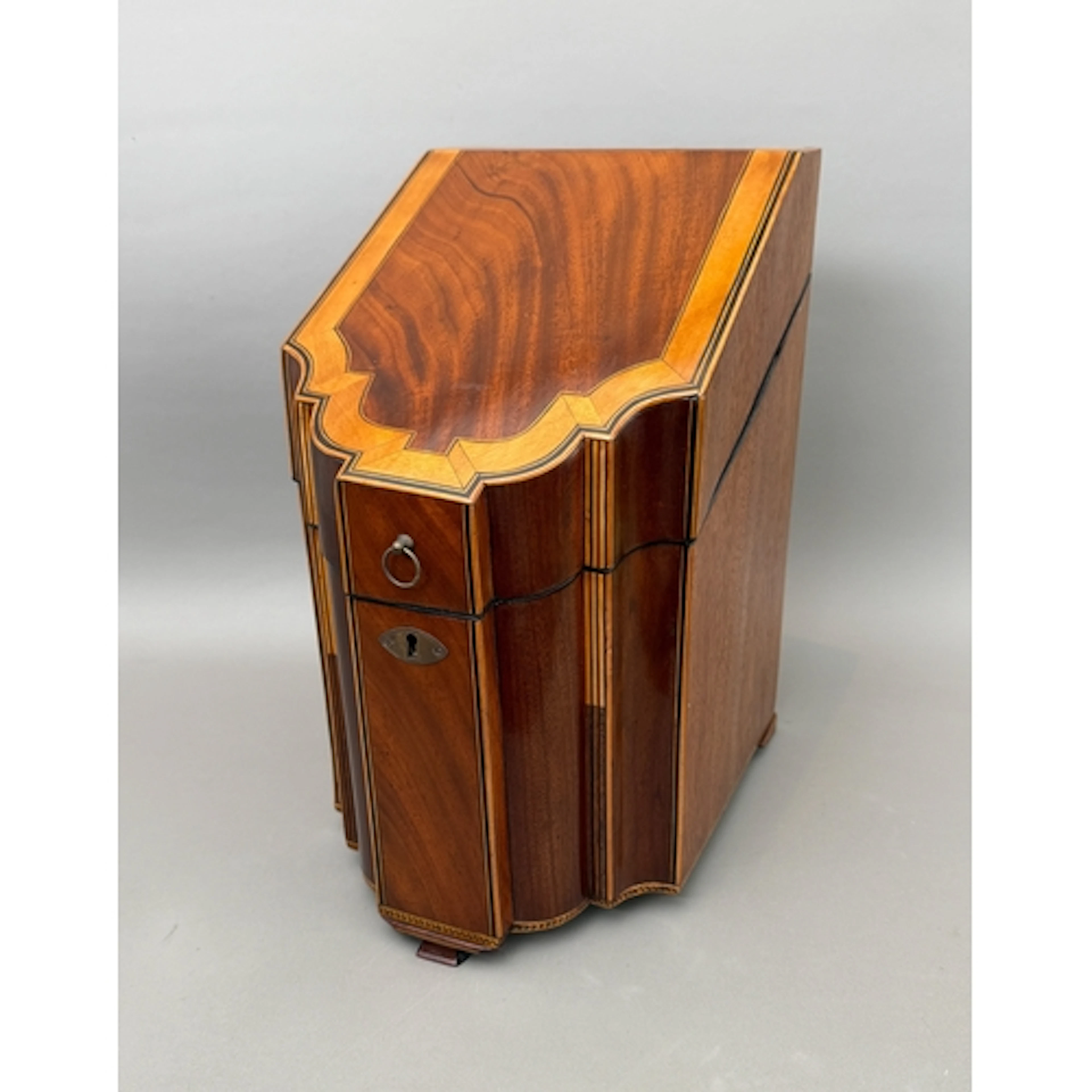 A fine quality George III mahogany knife box - with serpenti...