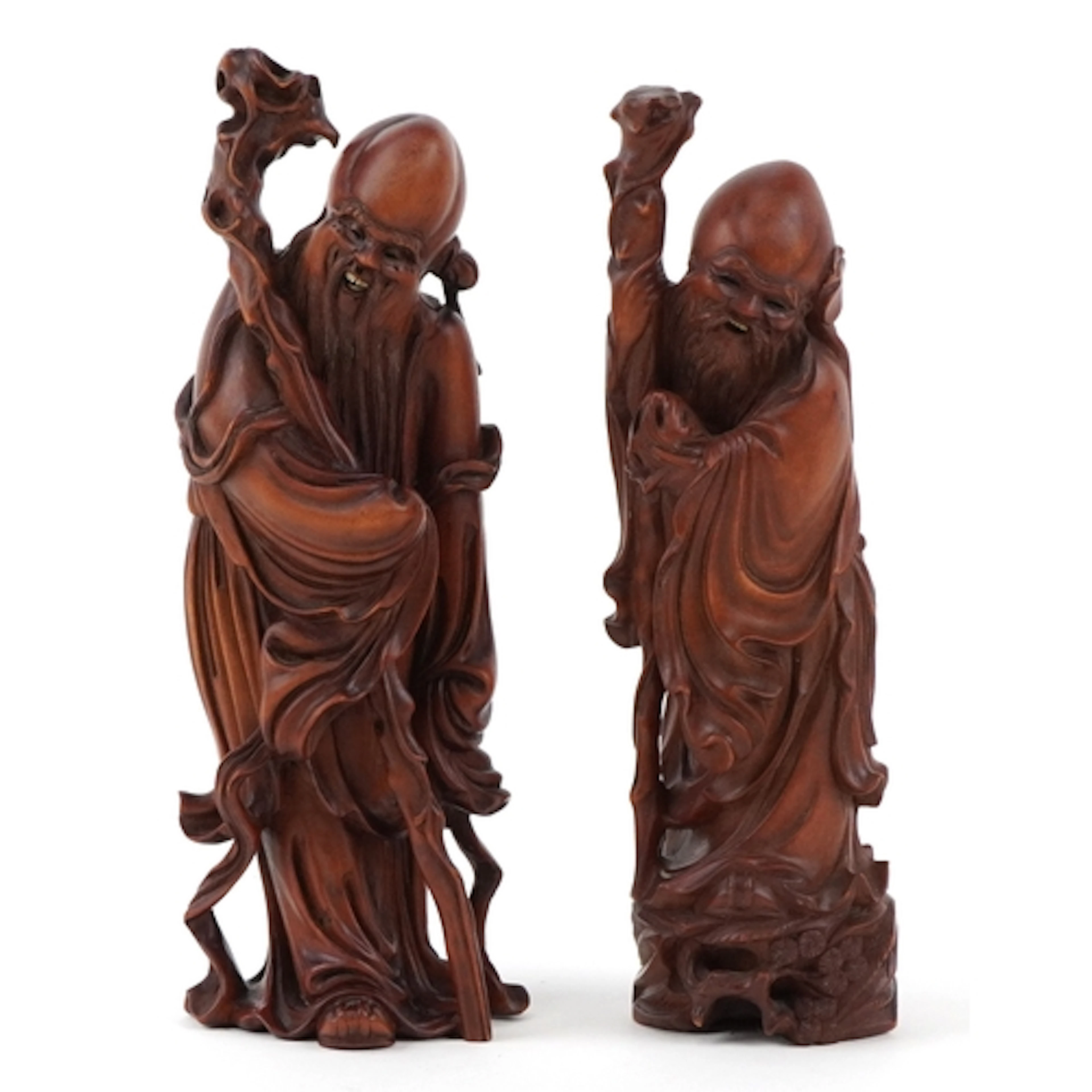 Two Chinese boxwood carvings of Shou Lao, God of Longevity, ...