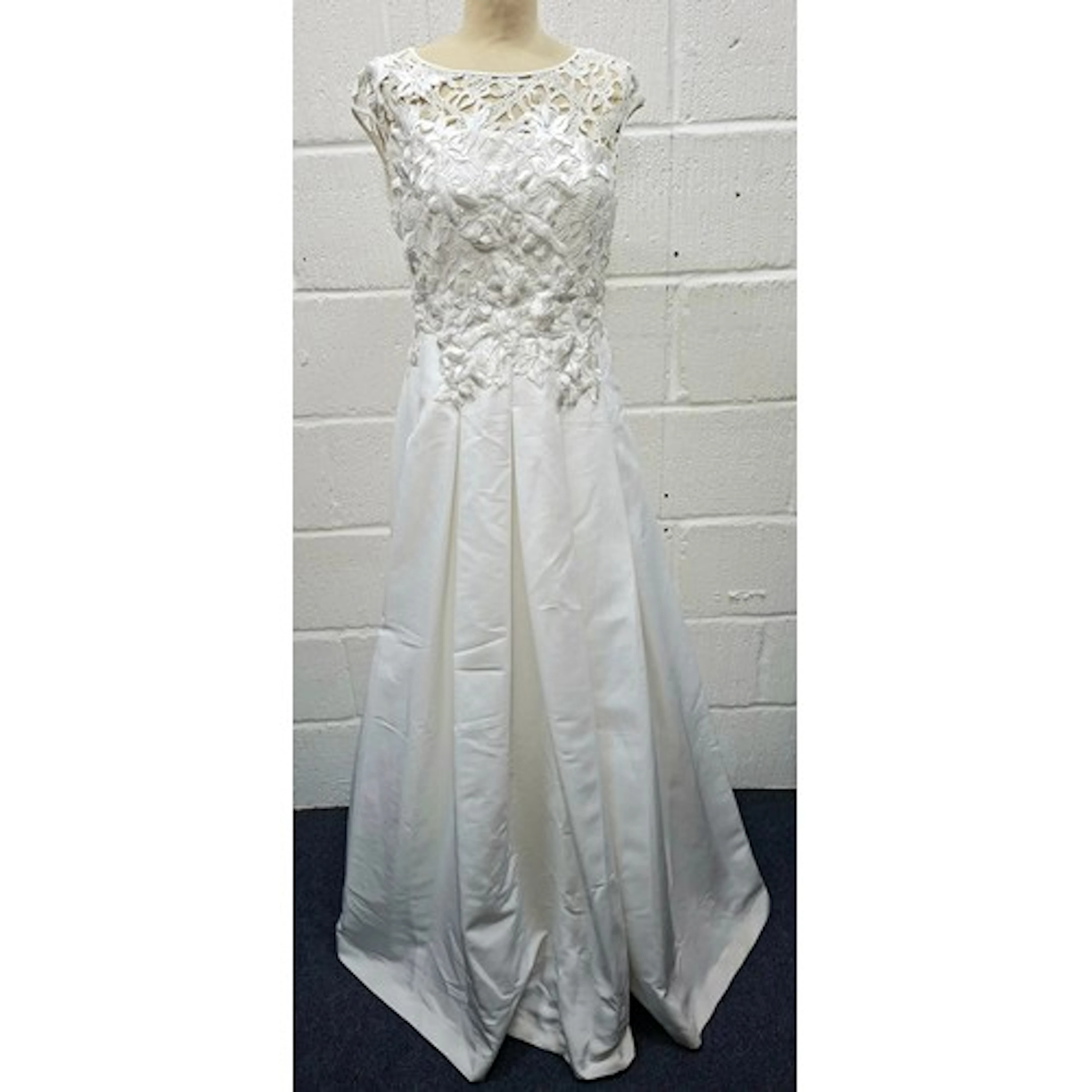Ted Baker- An un-used white wedding dress having an embroide...