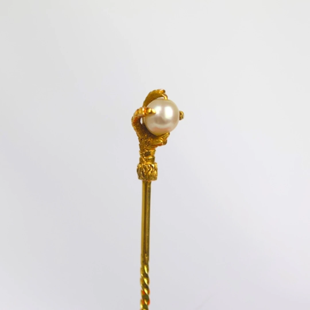 An early 20th century stick pin, the Eagle's claw realistica...