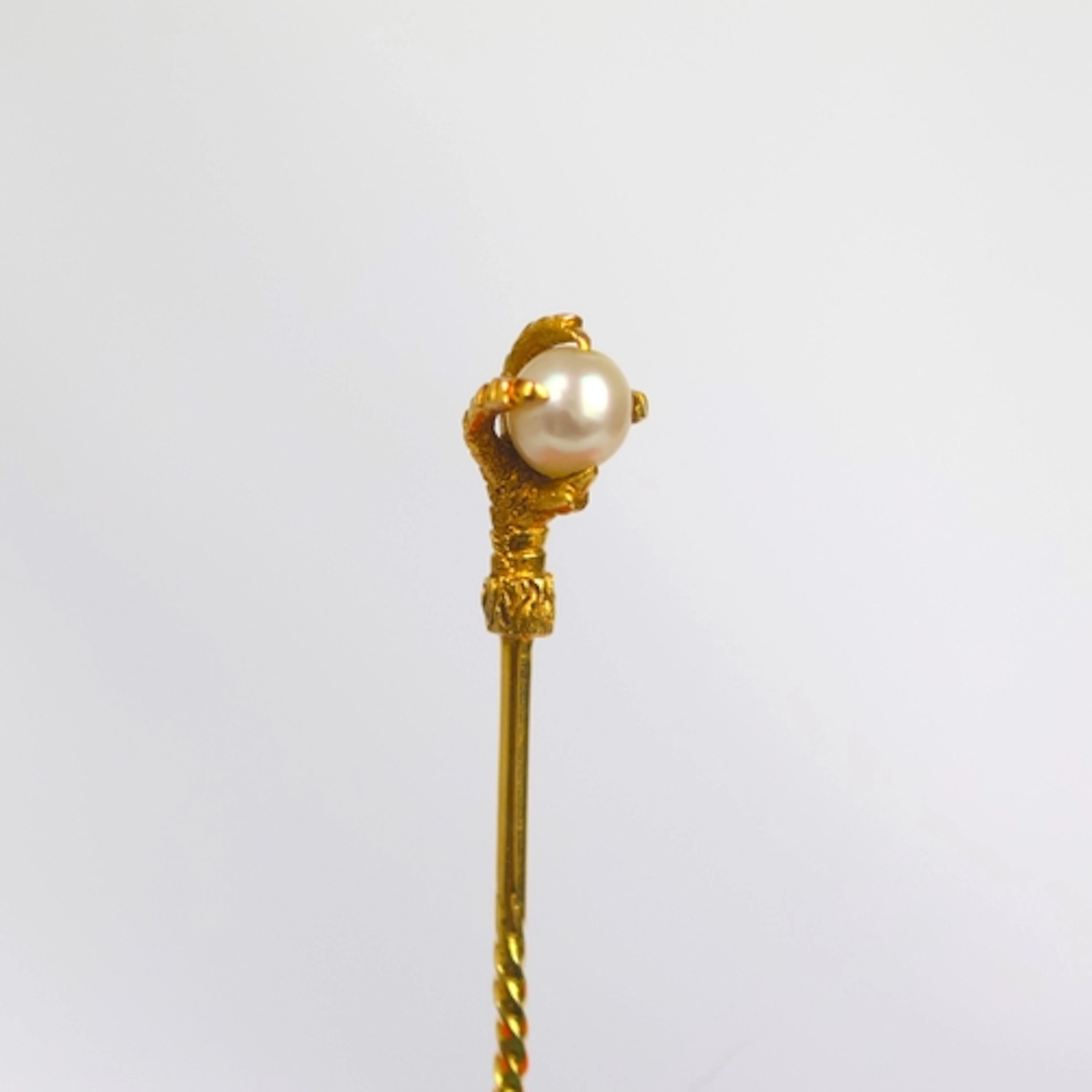 An early 20th century stick pin, the Eagle's claw realistica...