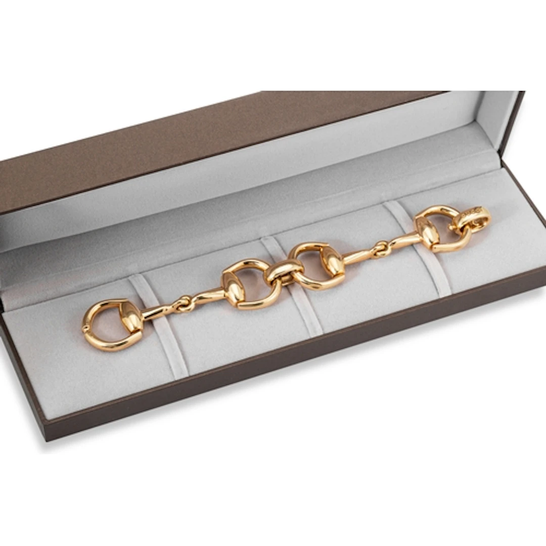 AN 18CT YELLOW GOLD ITALIAN 'GUCCI' DOUBLE SNAFFLE BIT BRACE...