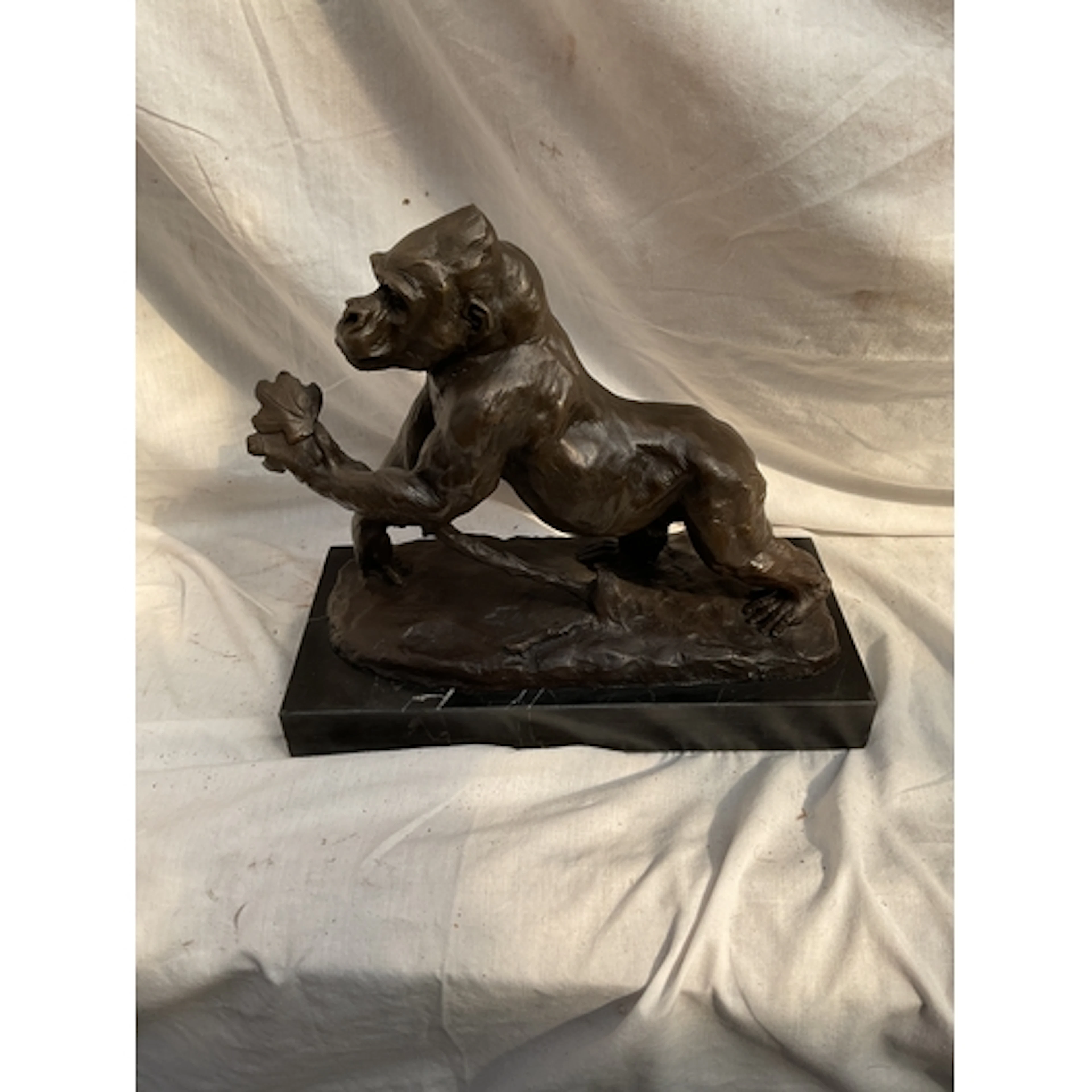 After Rembrandt Bugatti, a bronze Gorilla on marble base. H ...