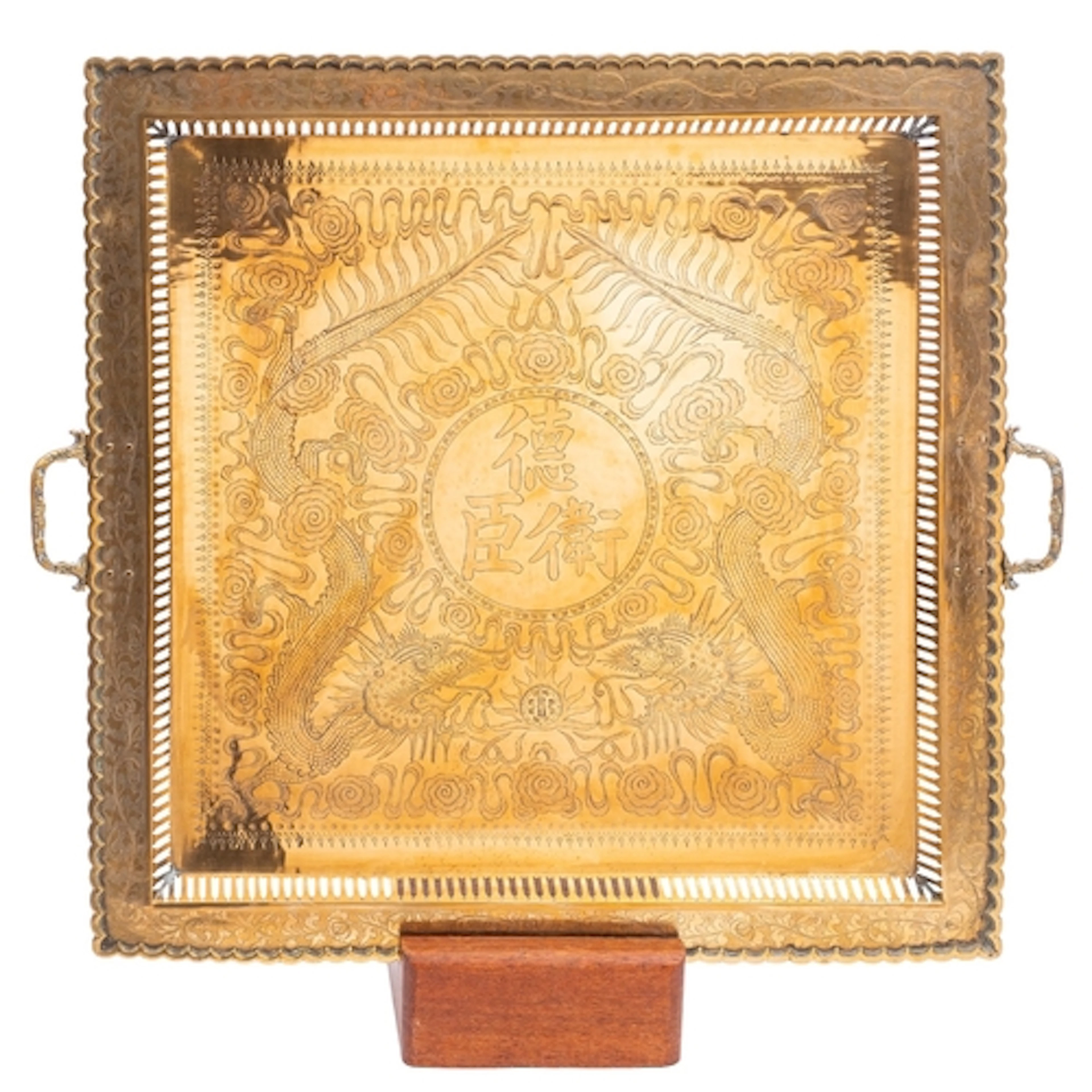 A large Chinese two-handled brass tray, 20th century engrave...