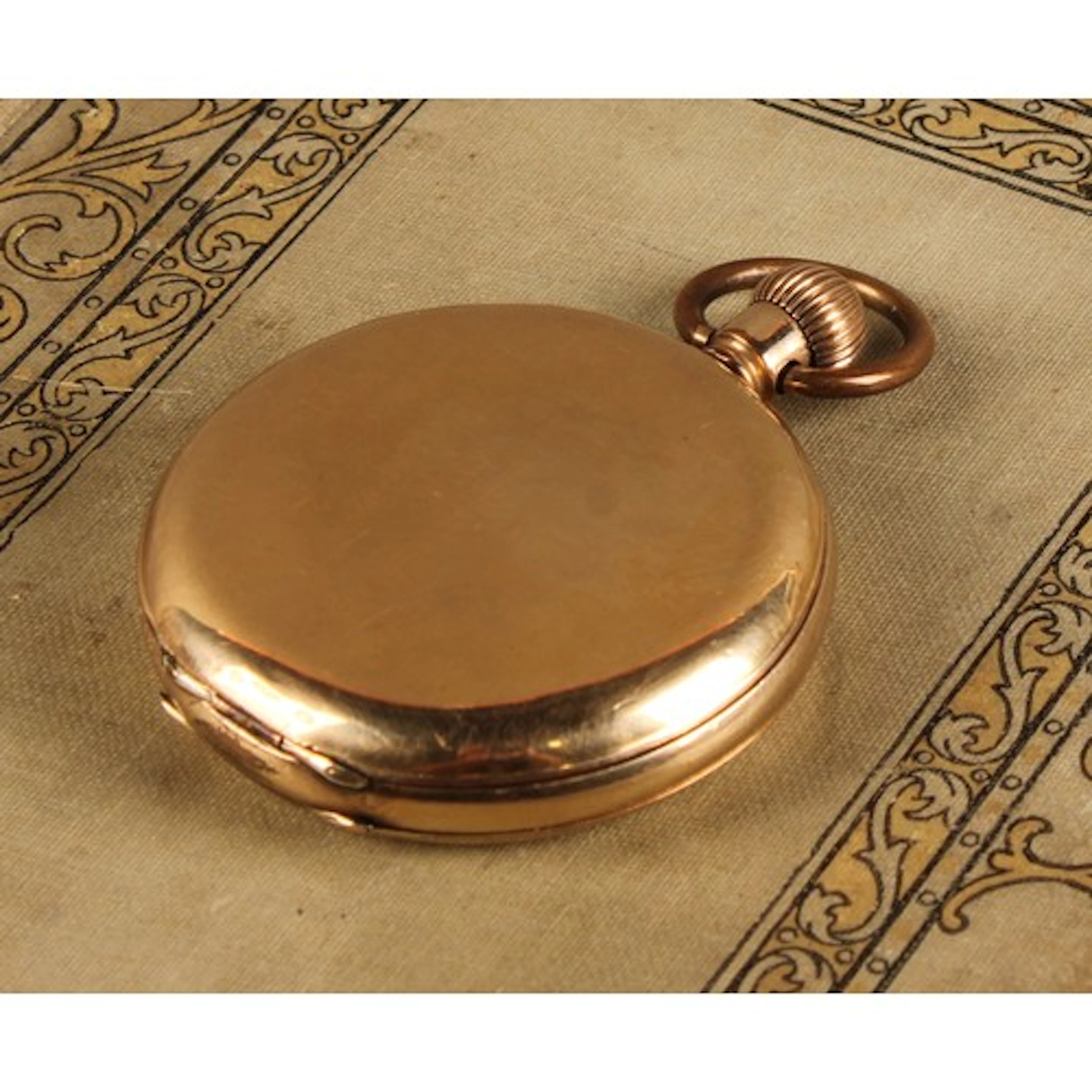 An early 20th century rolled gold hunter pocket watch, ename...