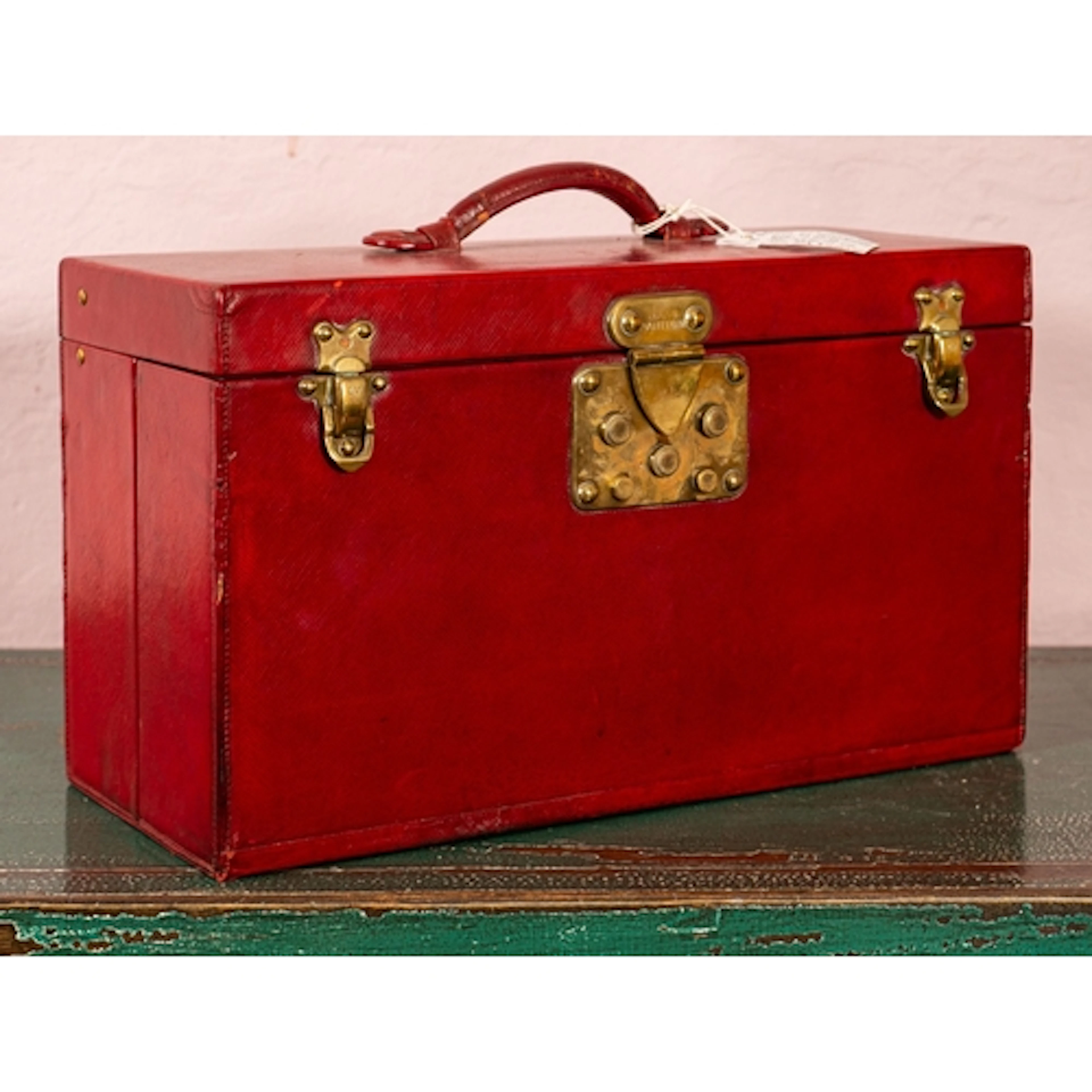 Louis Vuitton; a fine red leather travelling dressing case, ...