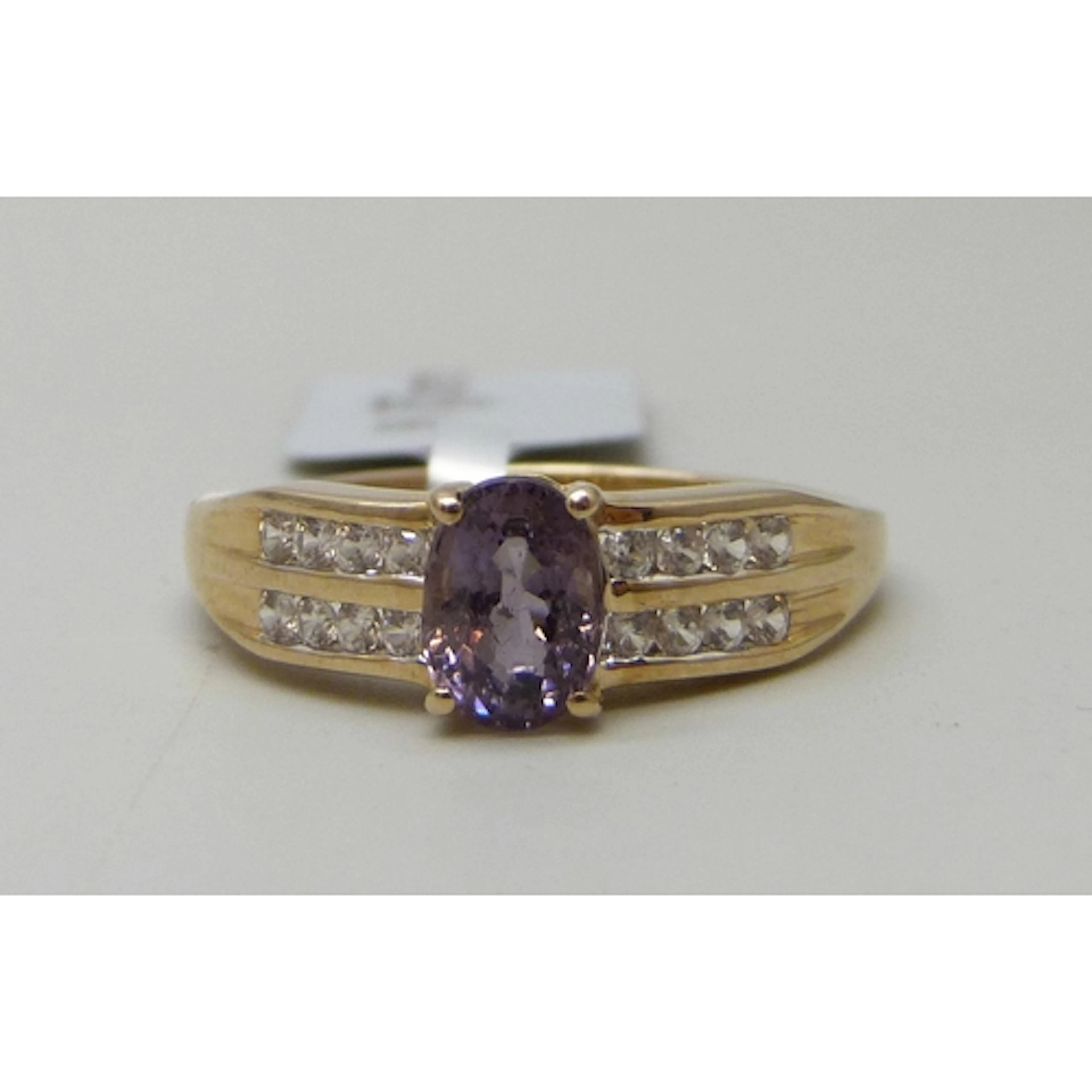 A Gemporia 9ct gold, purple and white stone ring, with tag, ...