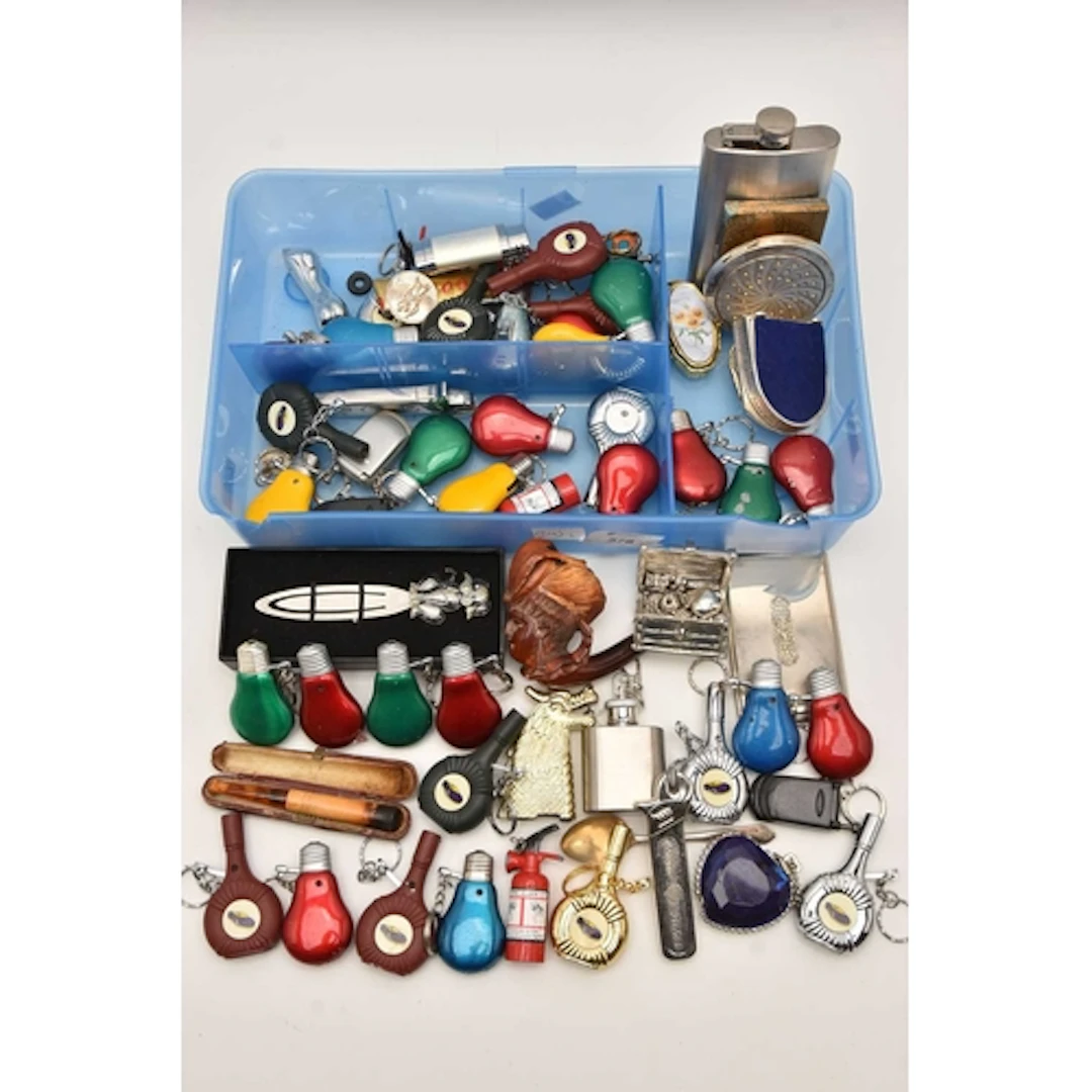 AN ASSORTMENT OF LIGHTERS AND ITEMS ETC, to include various ...