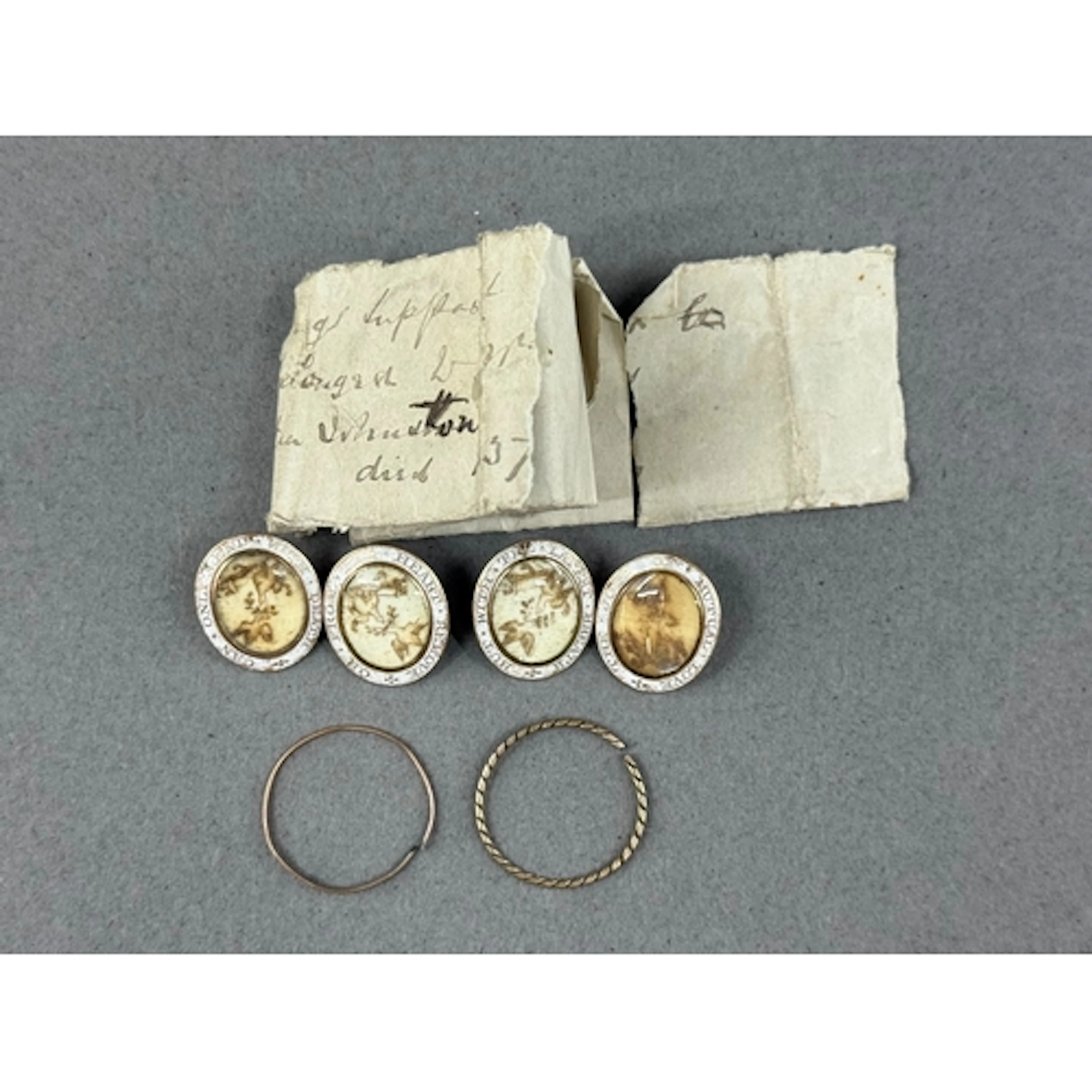 Jewellery: a pair of early 19th century yellow metal mournin...