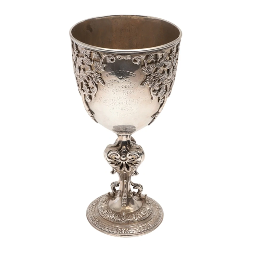 AN ORNATE VICTORIAN SILVER CUP, MILITARY INTEREST. The bowl ...