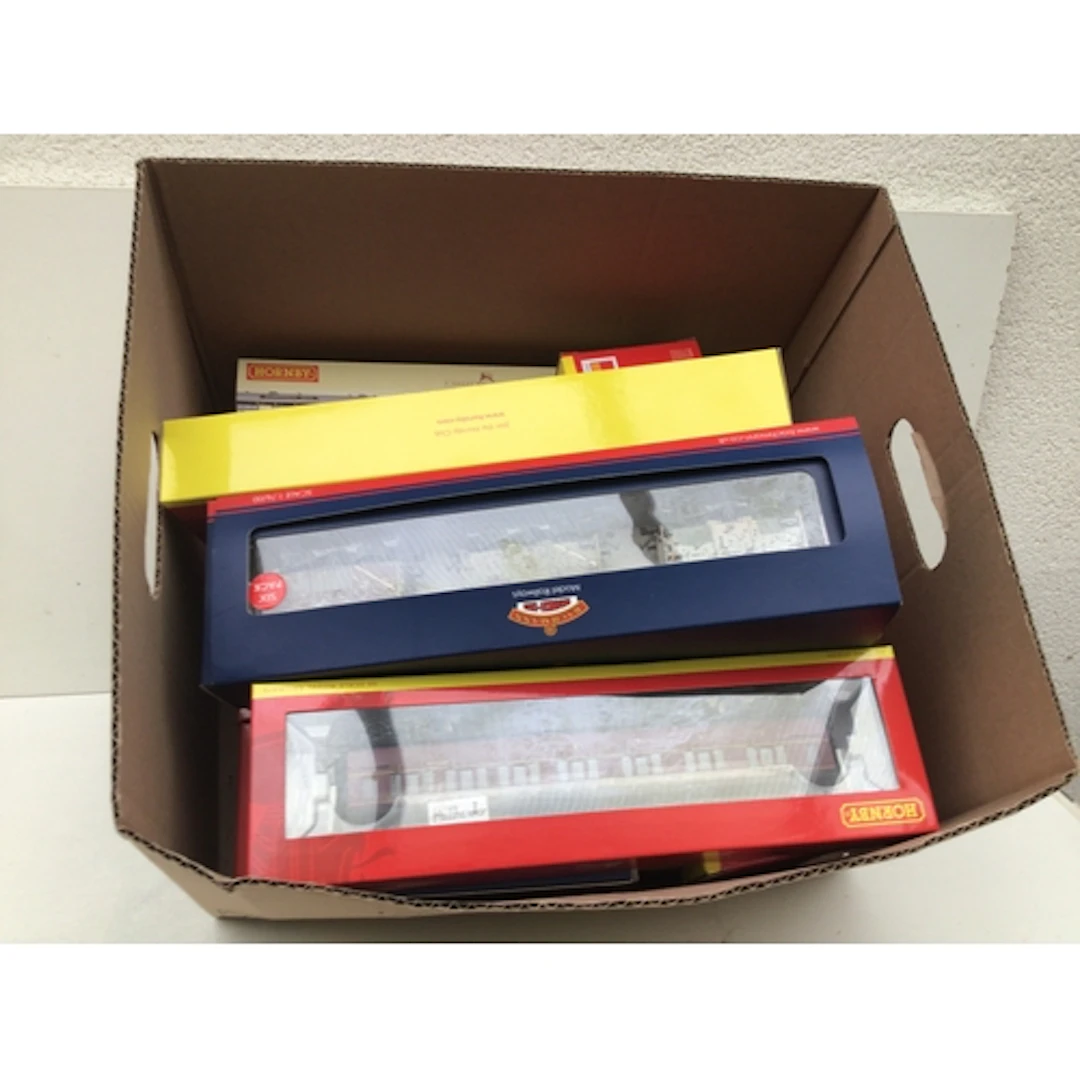 A Collection of boxed model railway wagons and coaches by Ho...