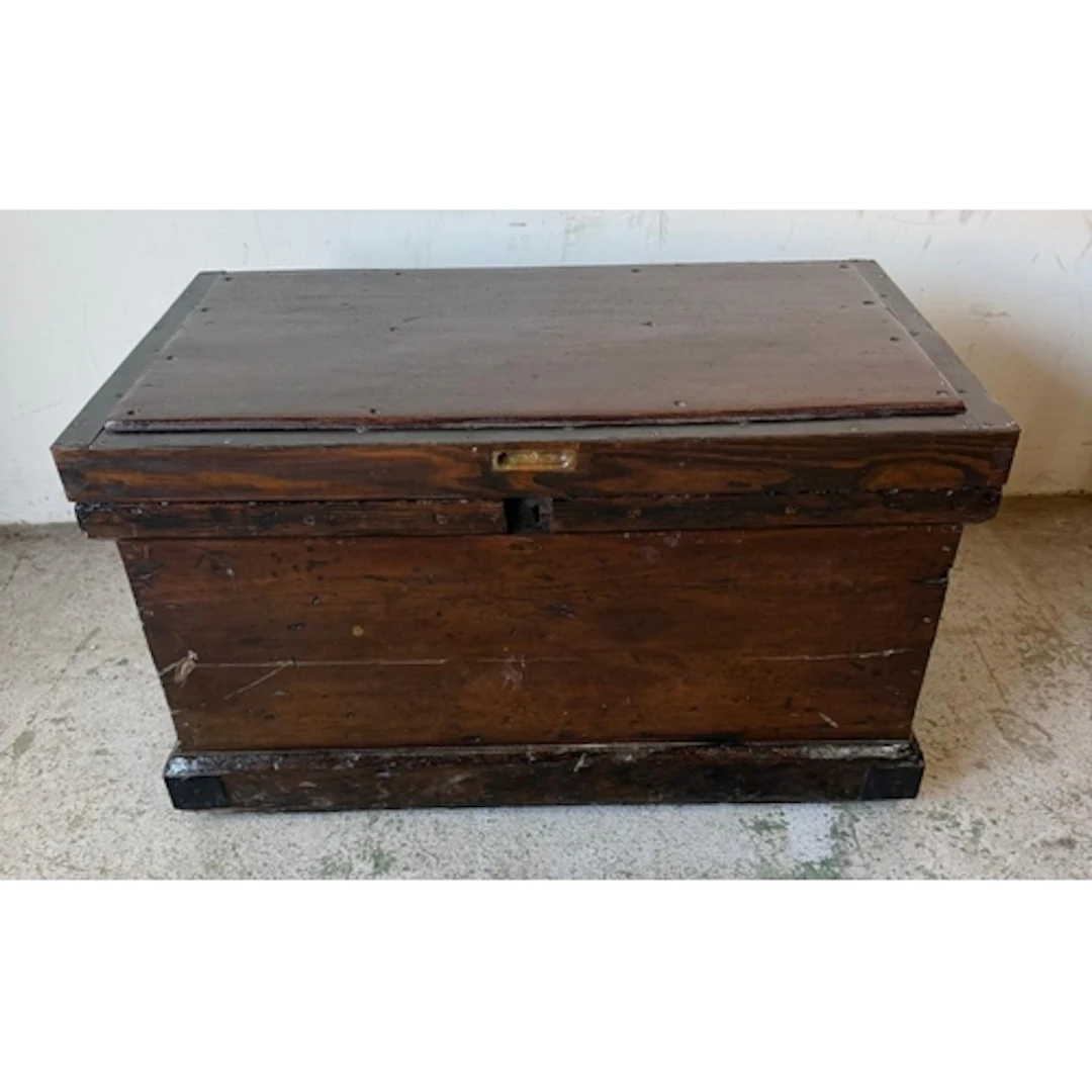 A scatch built storage trunk, resembling a carpenters chest ...
