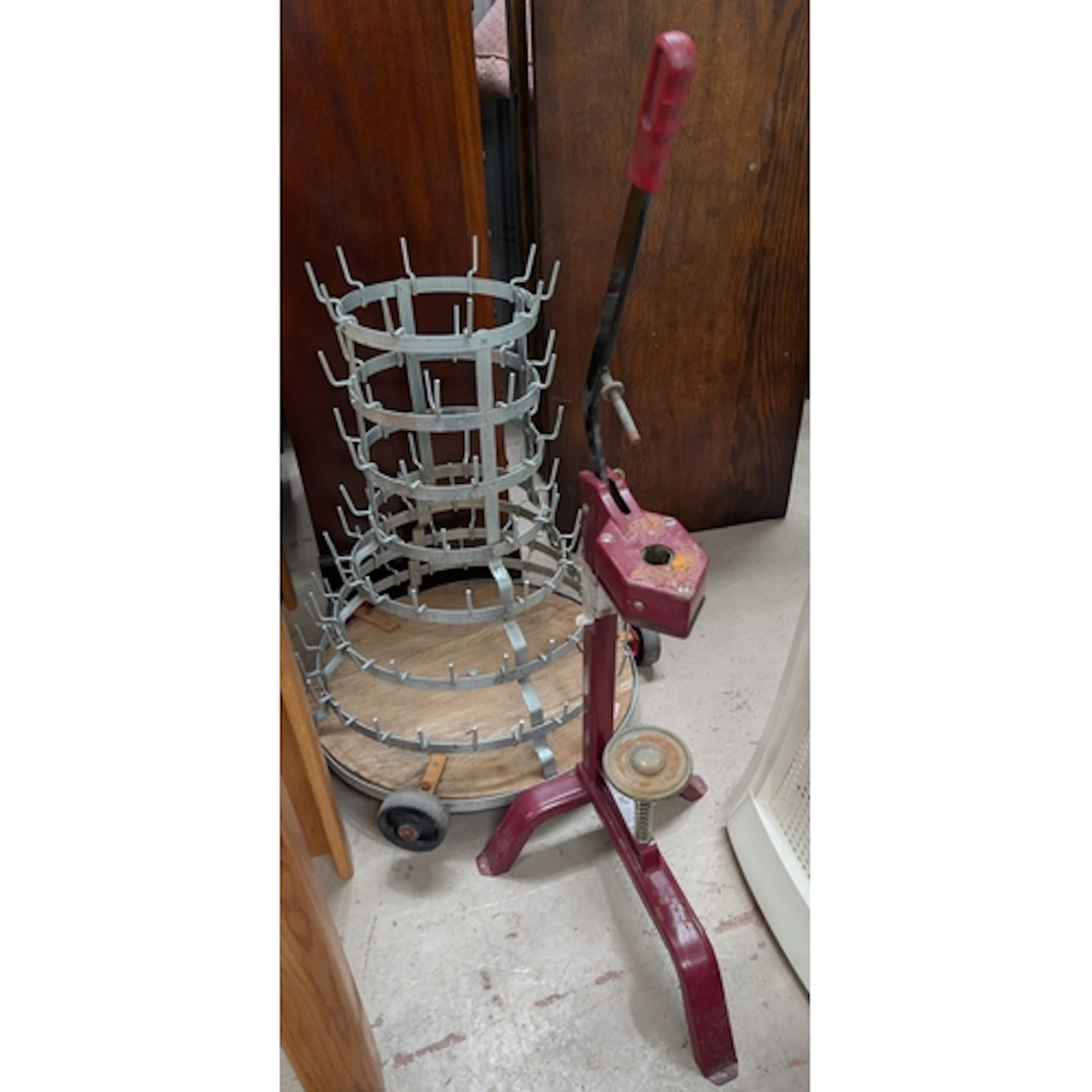 A vintage French "hedgehog" bottle drying rack, galvanised m...